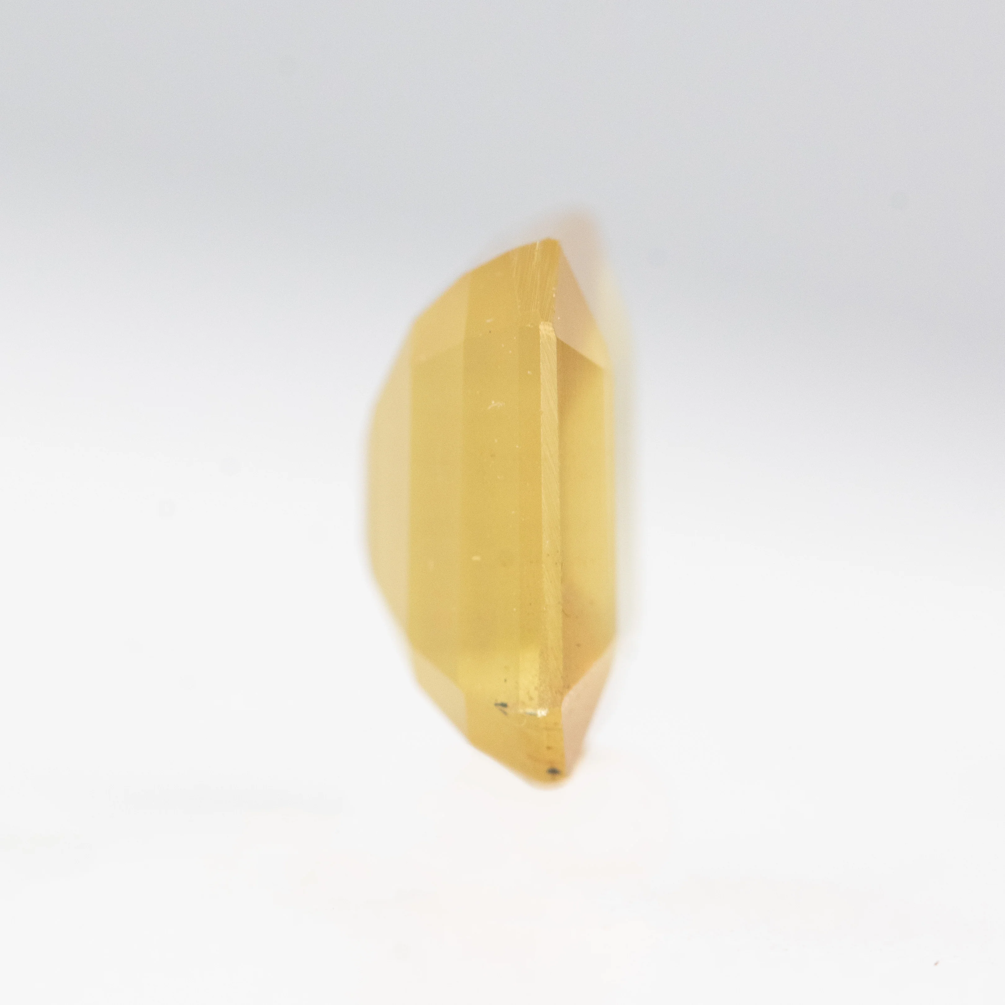 1.89 Carat Yellow-Orange Emerald Cut Sapphire for Custom Work - Inventory Code OES189 - Image 5