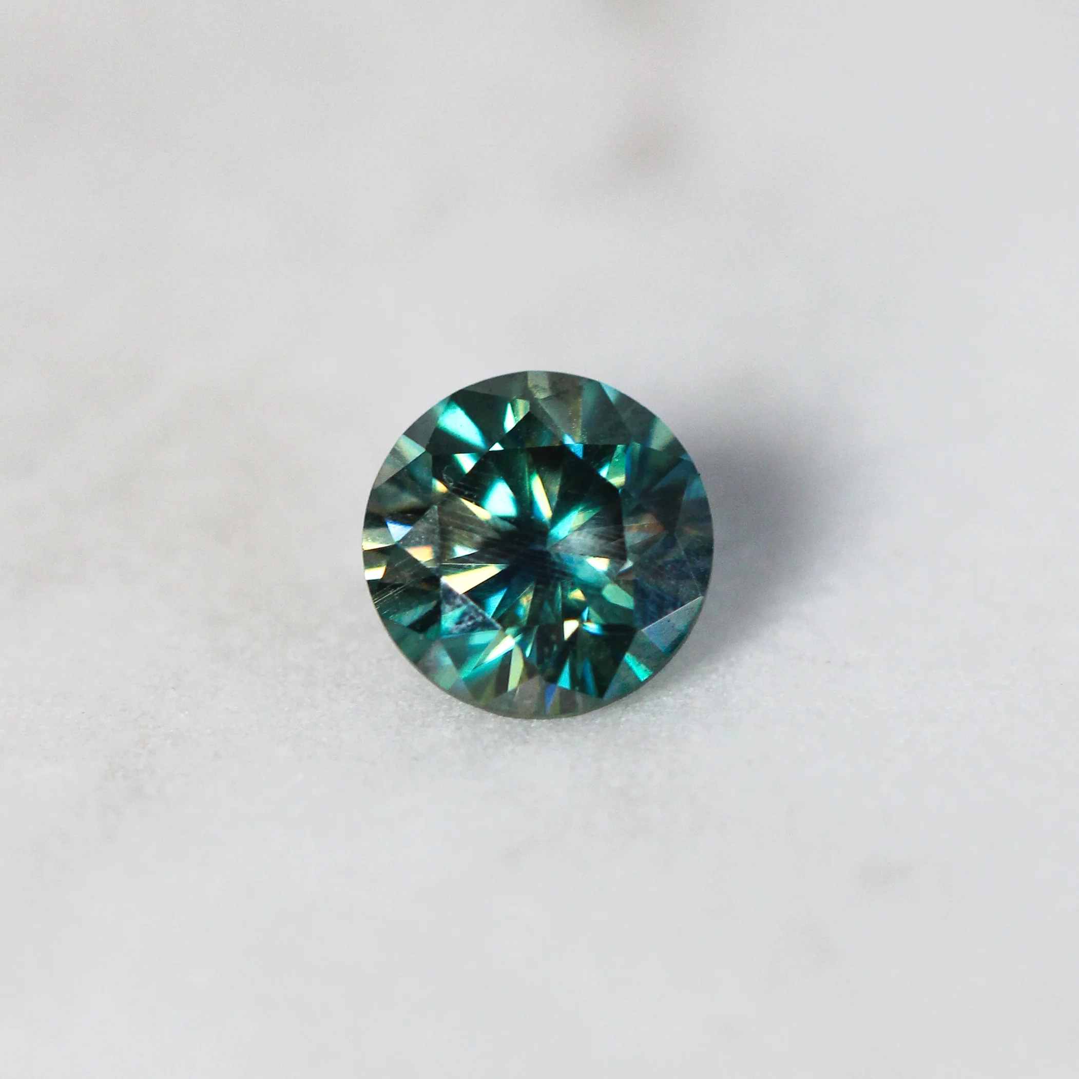 0.80 Carat Round Black & Teal Moissanite - Inventory Code MO70 - Image 3