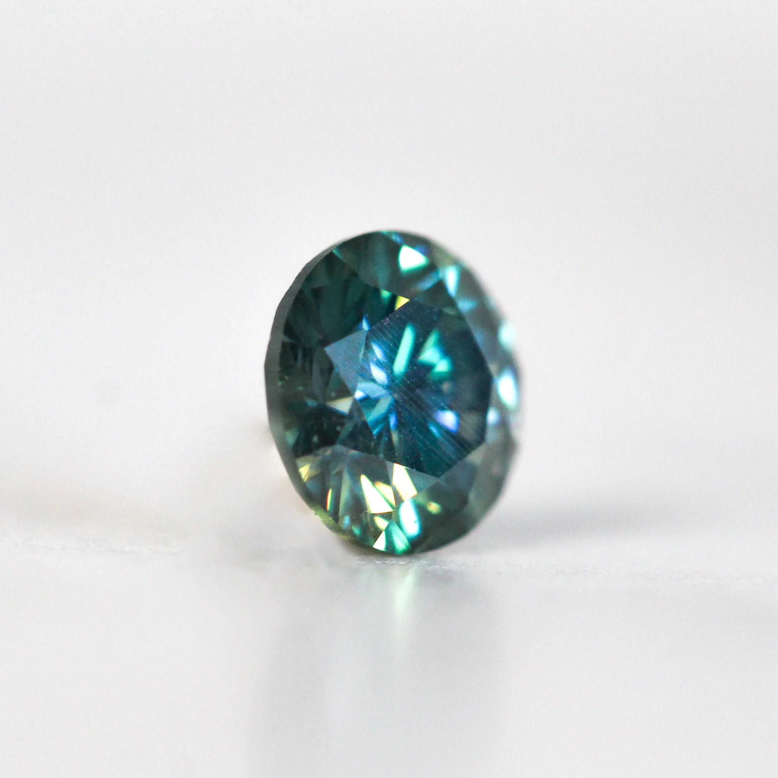 0.80 Carat Round Black & Teal Moissanite - Inventory Code MO70 - Image 4
