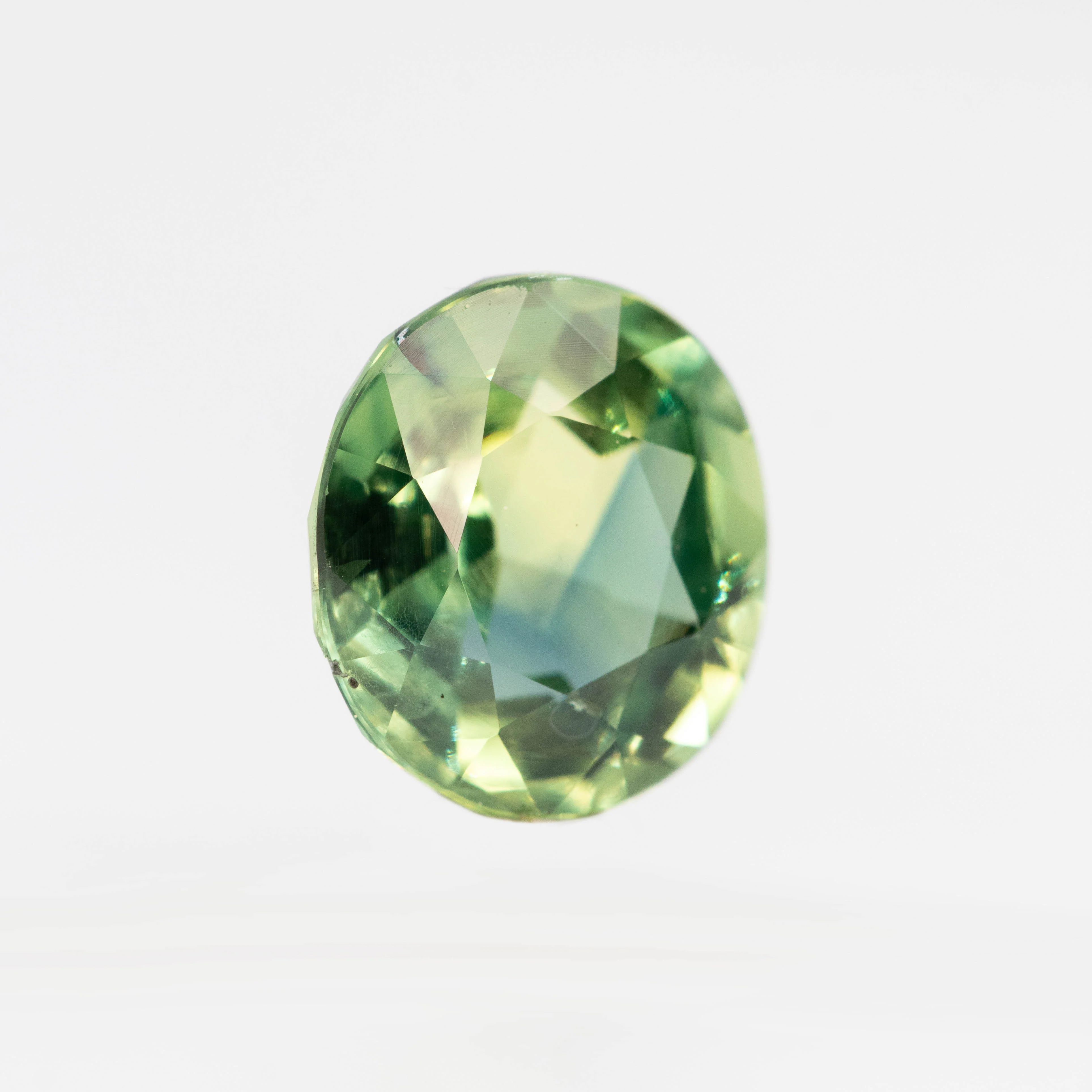 2.18 Carat Yellow-Green Oval Sapphire for Custom Work - Inventory Code MCOS218 - Image 4