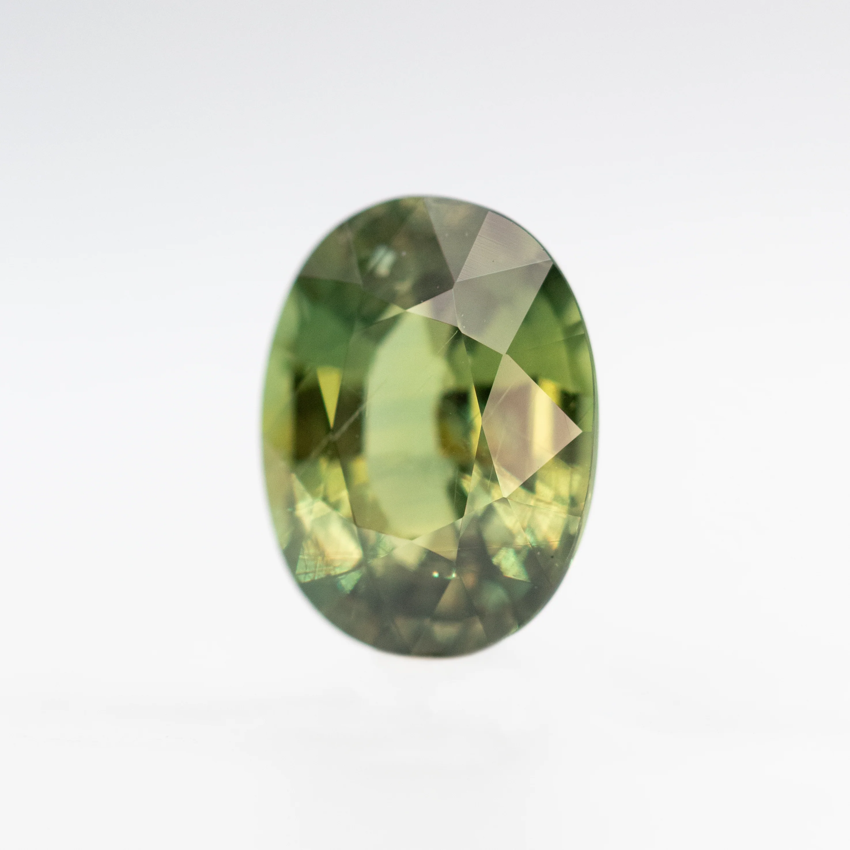 2.86 Carat Warm Green Oval Sapphire for Custom Work - Inventory Code GOS286 - Image 3