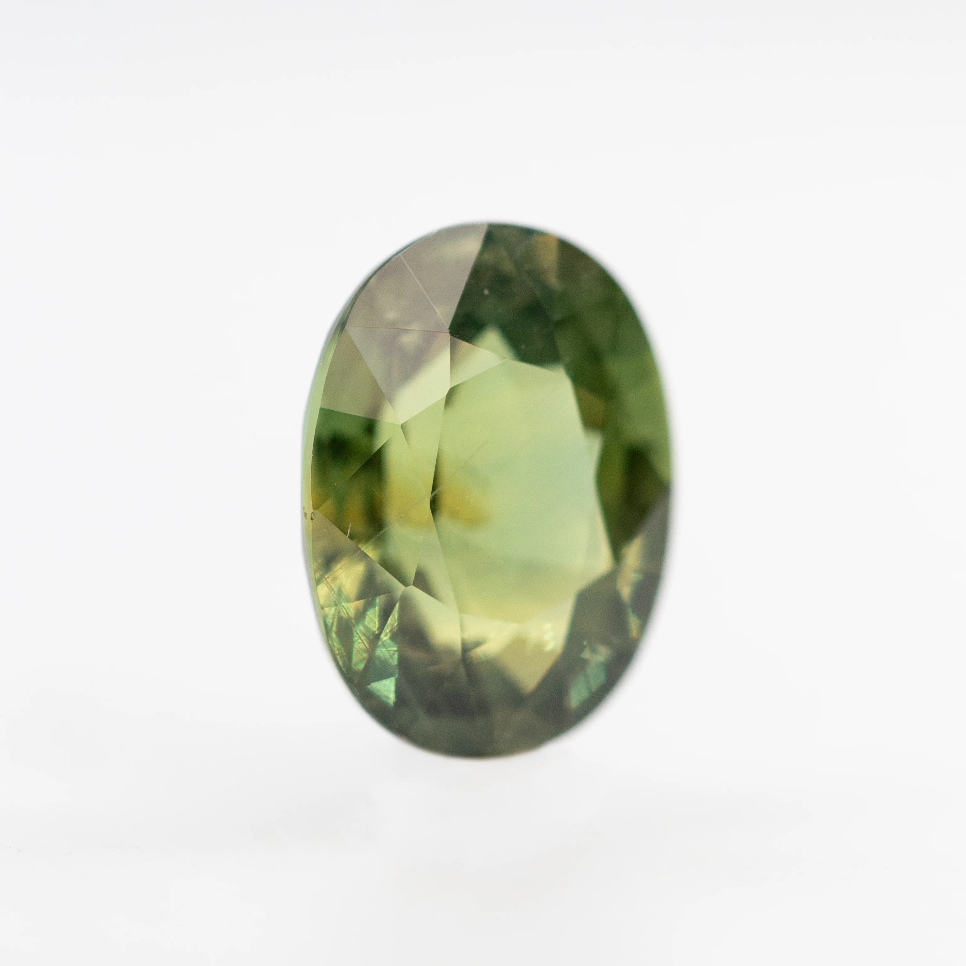 2.86 Carat Warm Green Oval Sapphire for Custom Work - Inventory Code GOS286 - Image 4