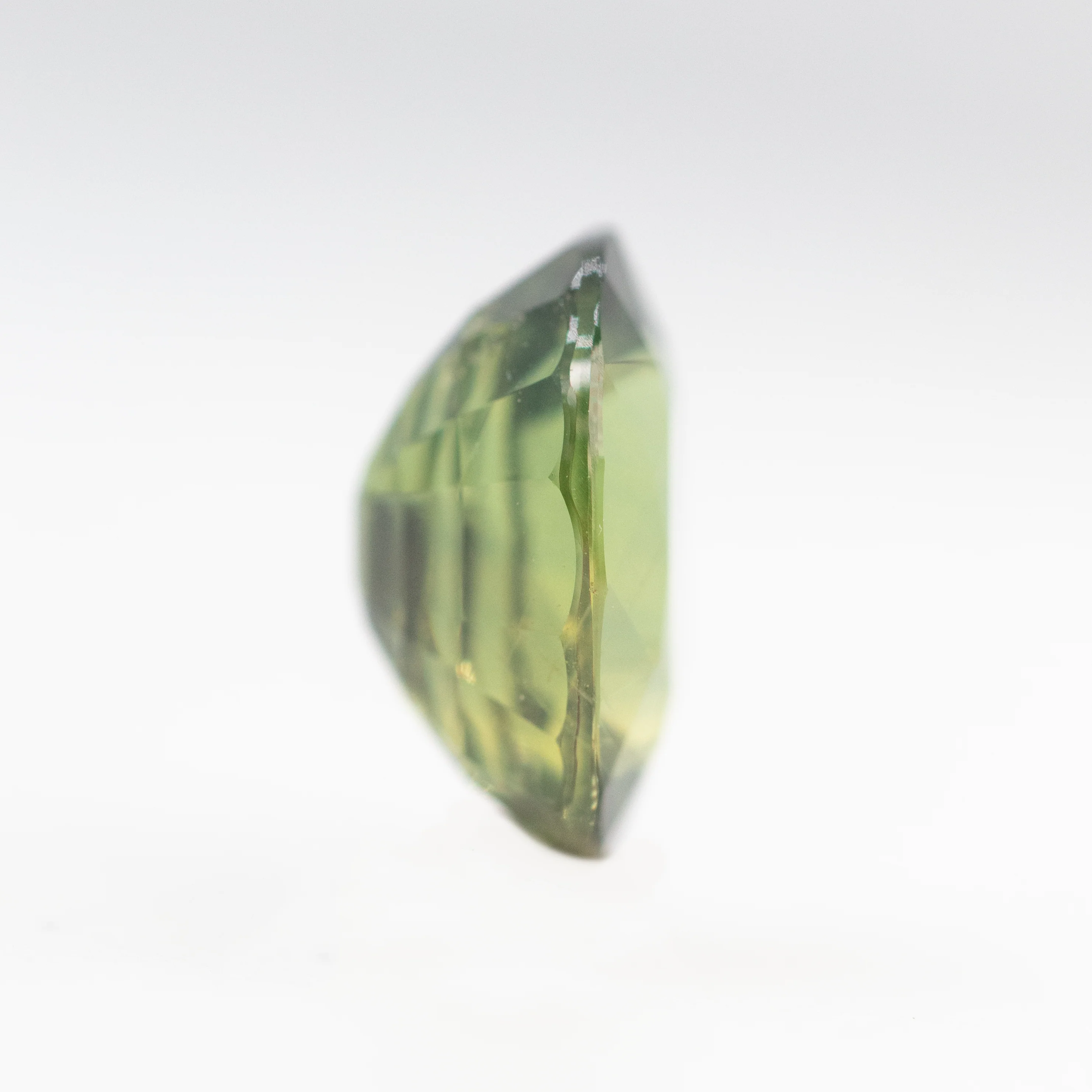 2.86 Carat Warm Green Oval Sapphire for Custom Work - Inventory Code GOS286 - Image 5