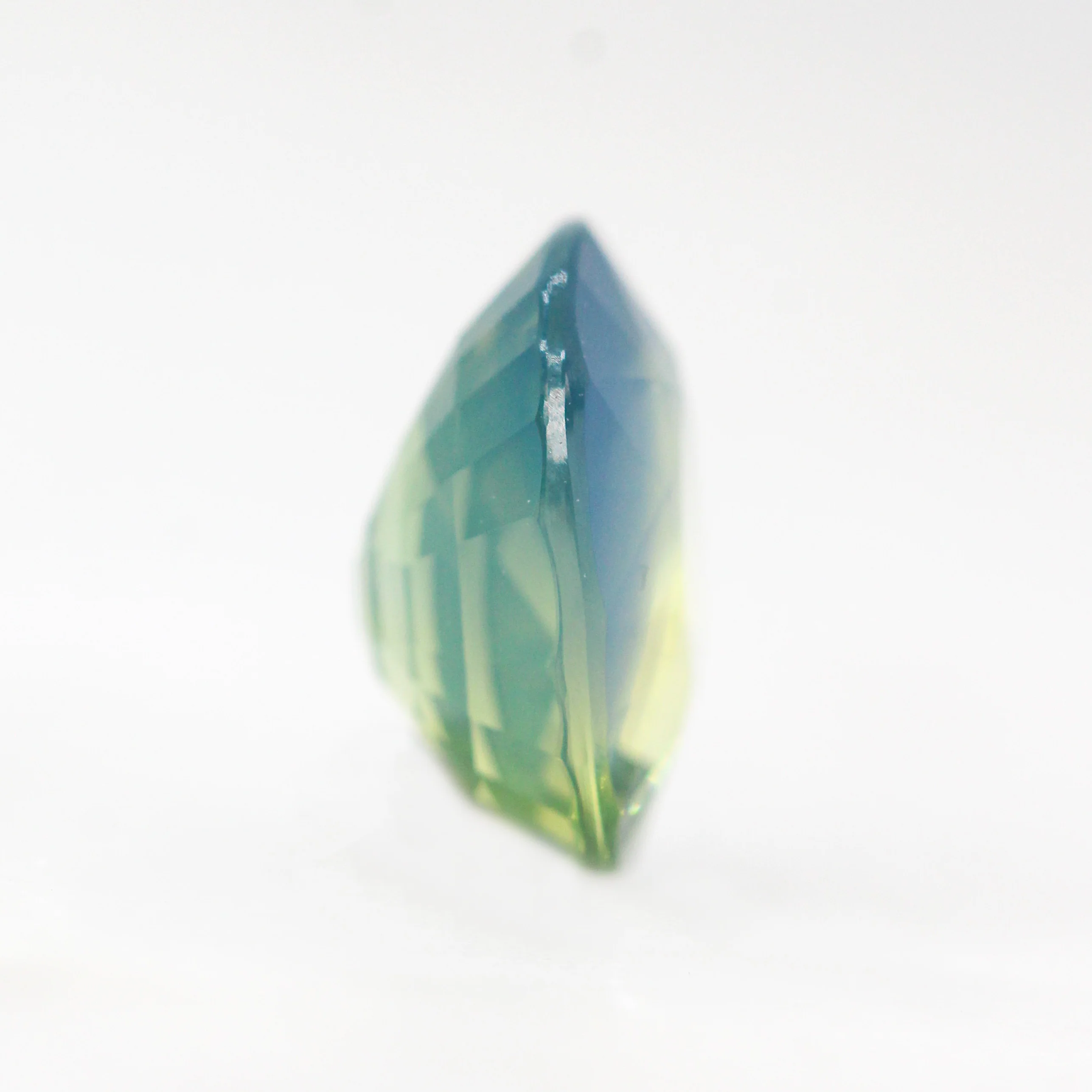 3.05 Carat Multicolor Opalescent Oval Sapphire for Custom Work - Inventory Code MCOS305 - Image 5