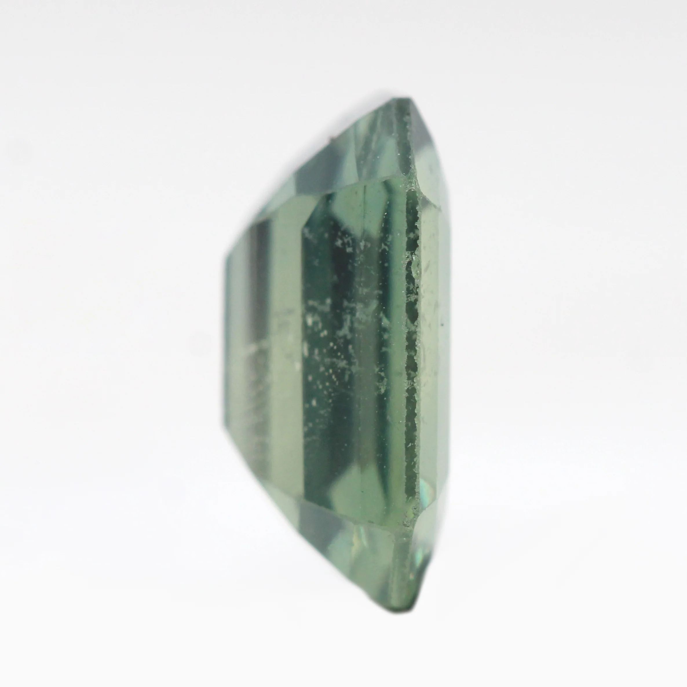 4.52 Carat Teal Color Change Emerald Cut Madagascar Sapphire for Custom Work - Inventory Code TGPS5452 - Image 6
