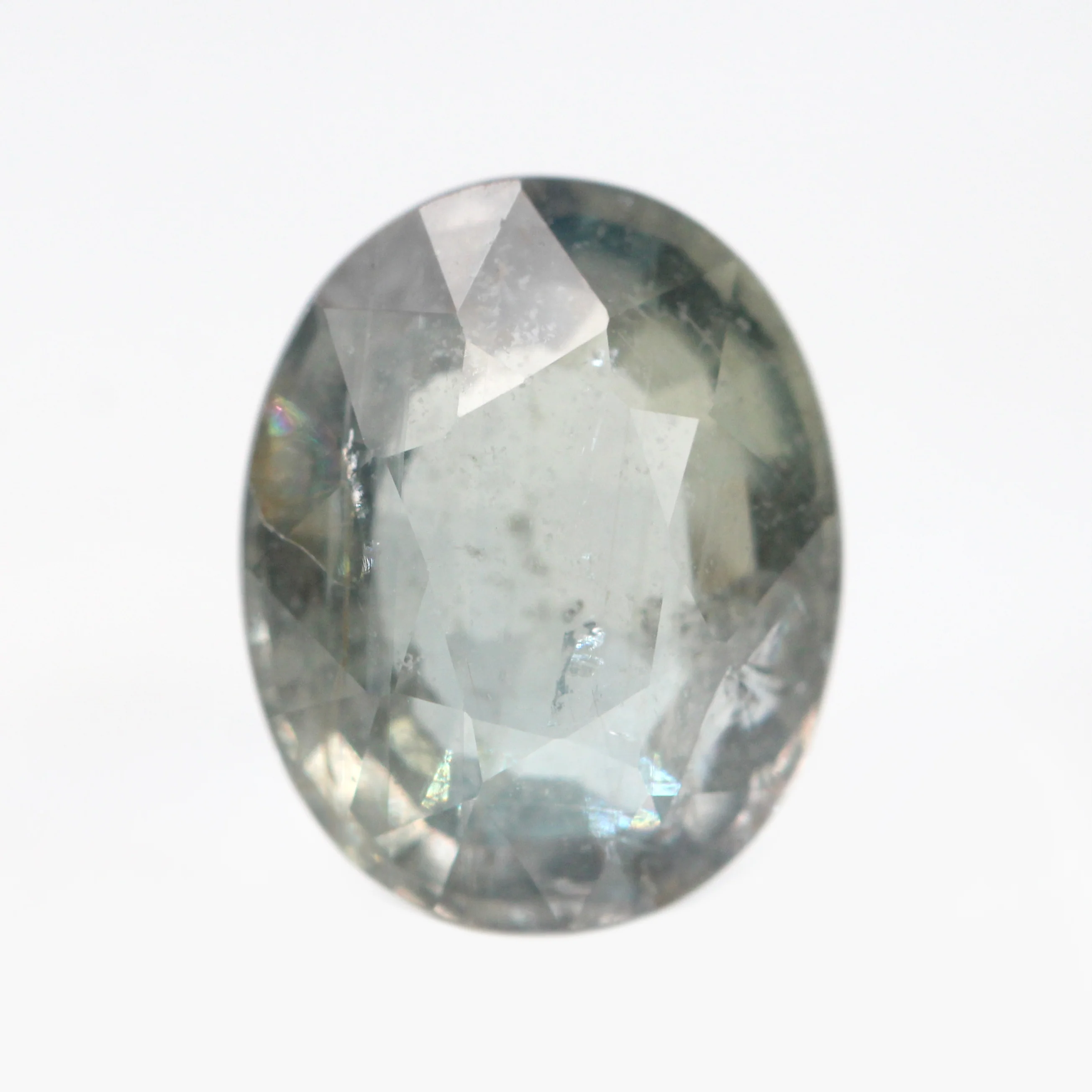 4.93 Carat Clear Gray Oval Sapphire for Custom Work - Inventory Code GOS493