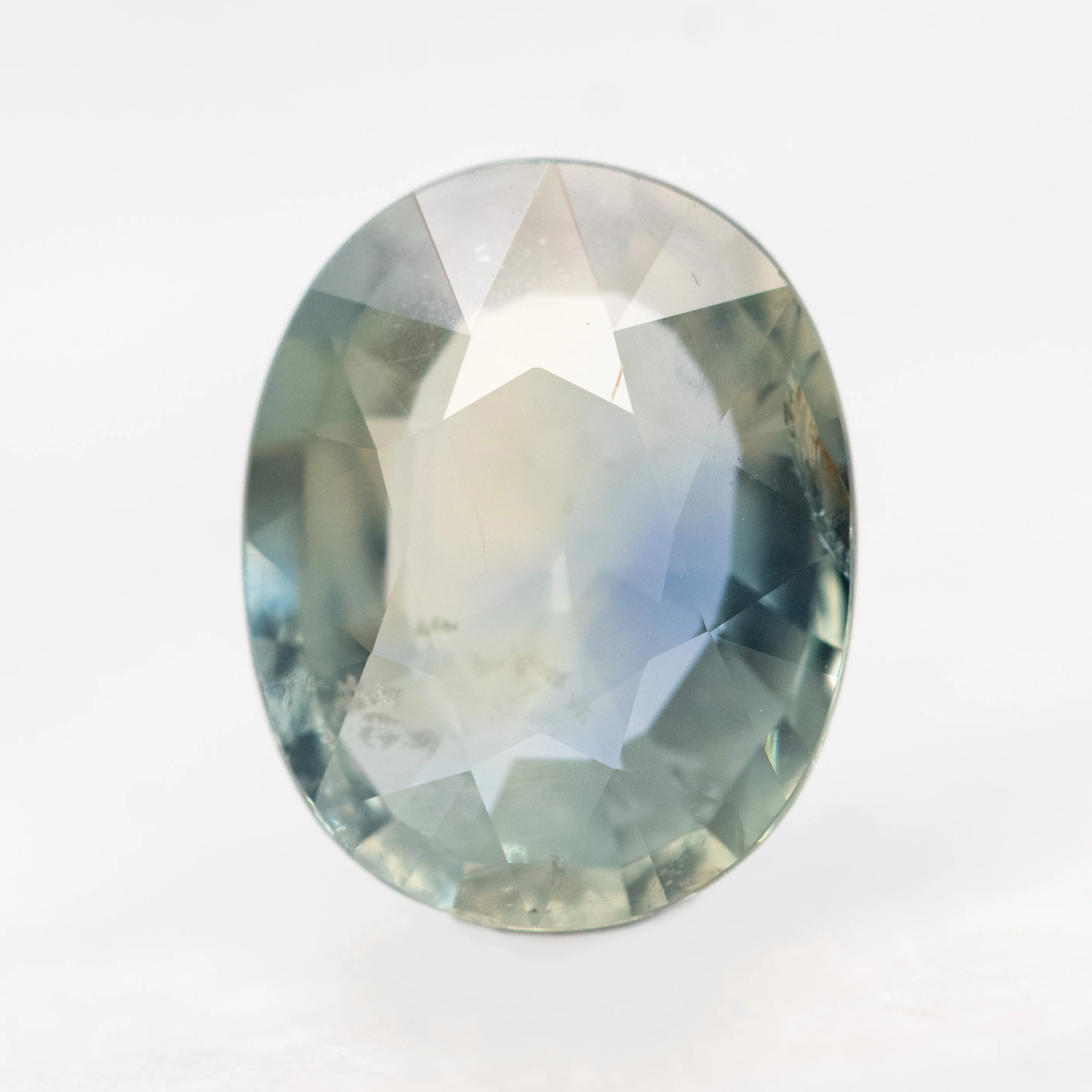 5.73 Carat Clear Earthy Oval Sapphire for Custom Work - Inventory Code CTOS573