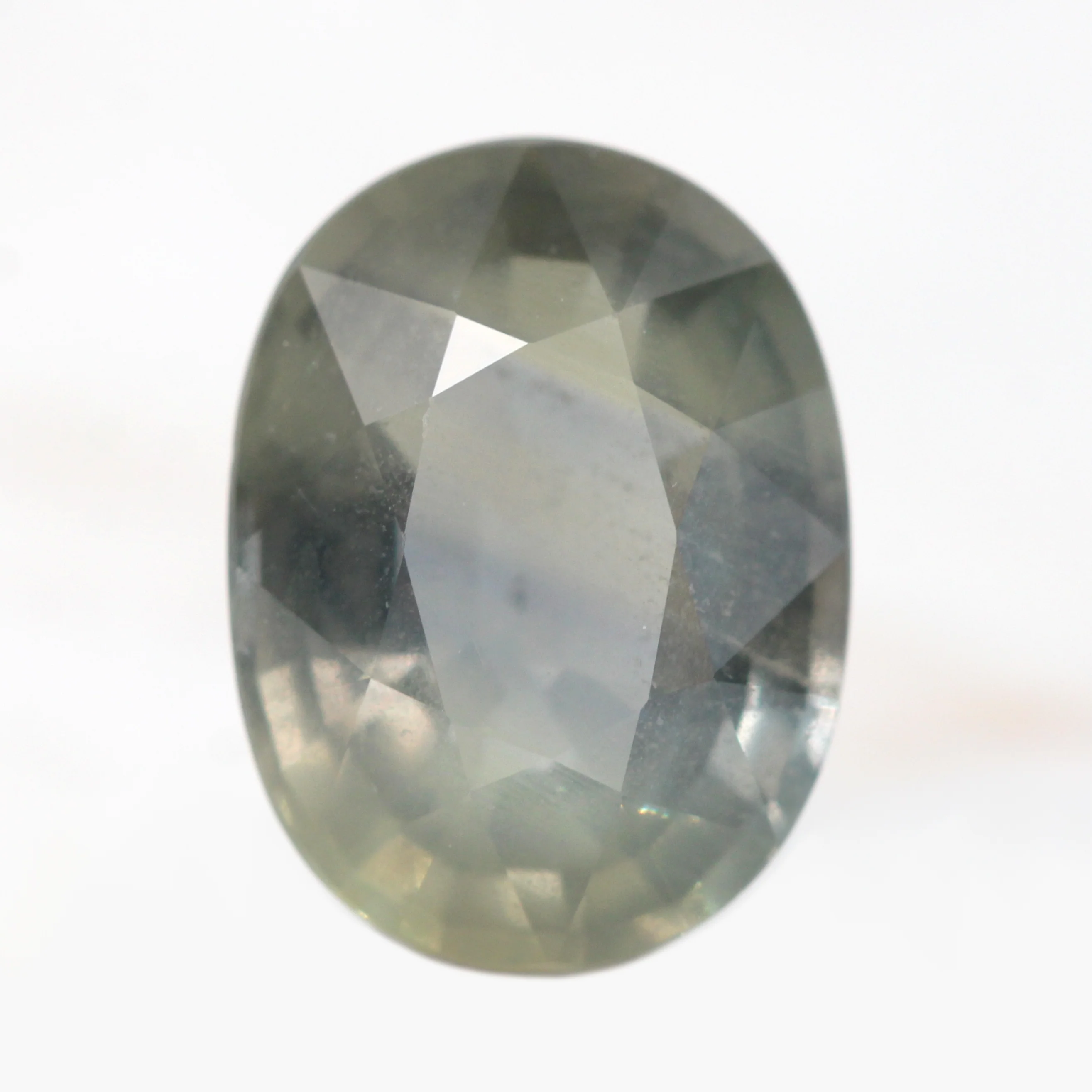5.88 Carat Gray Color Change Oval Sapphire for Custom Work - Inventory Code GOS588