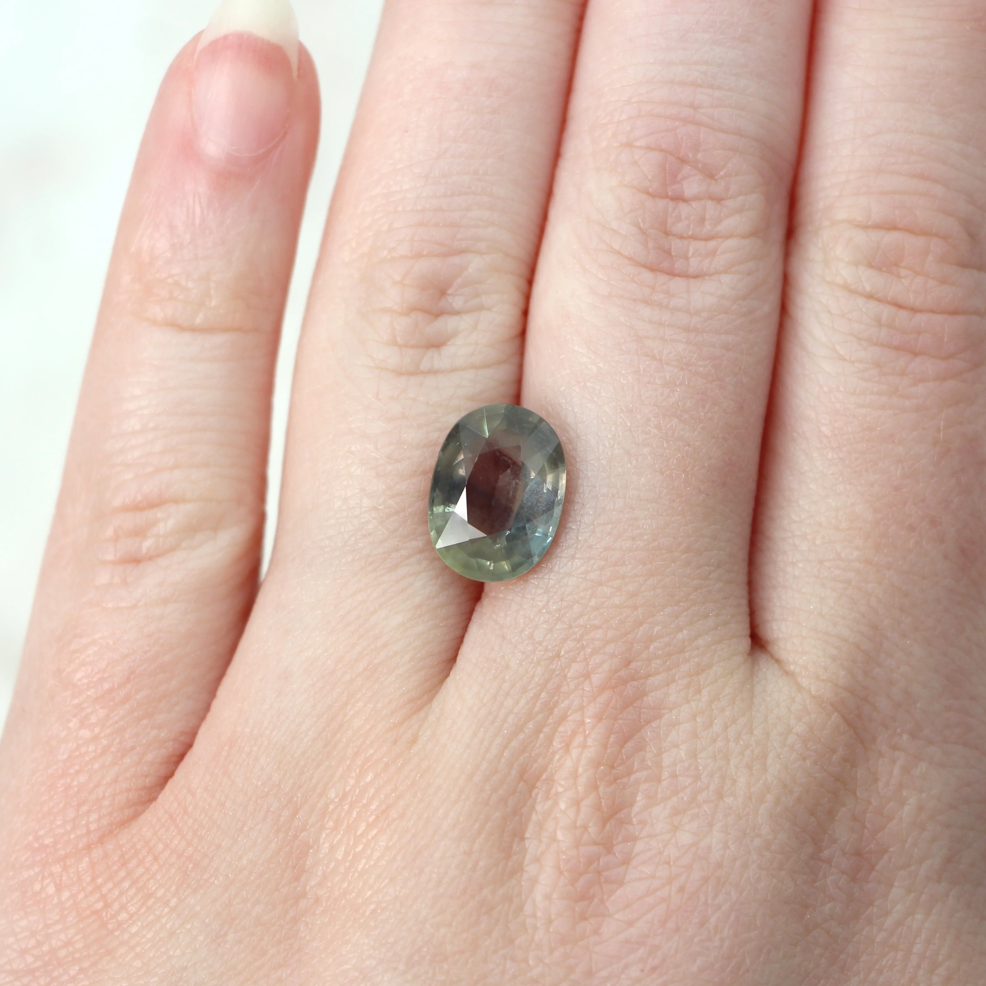 5.88 Carat Gray Color Change Oval Sapphire for Custom Work - Inventory Code GOS588 - Image 3