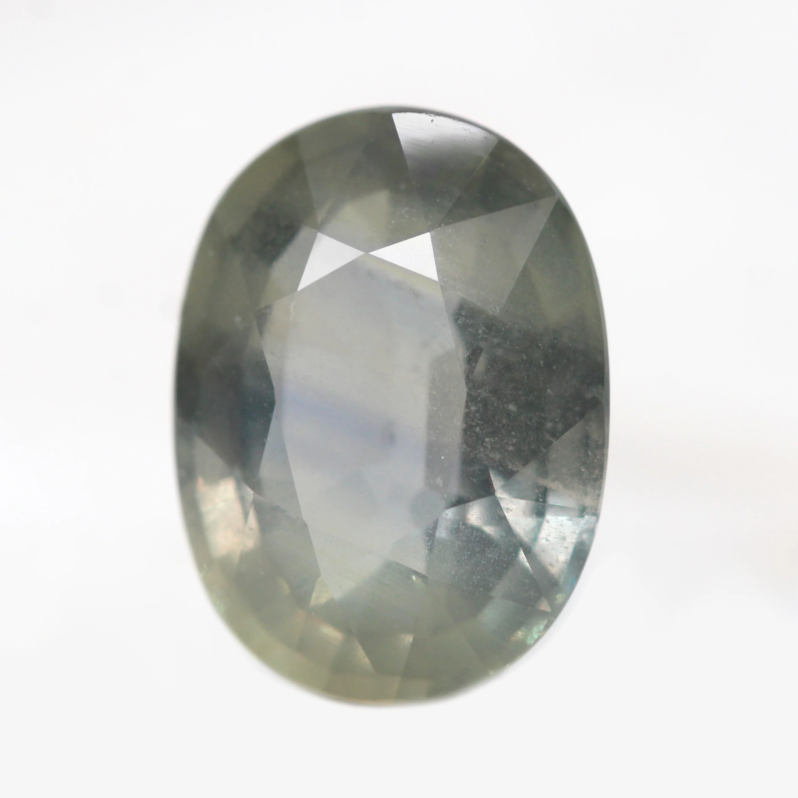 5.88 Carat Gray Color Change Oval Sapphire for Custom Work - Inventory Code GOS588 - Image 4