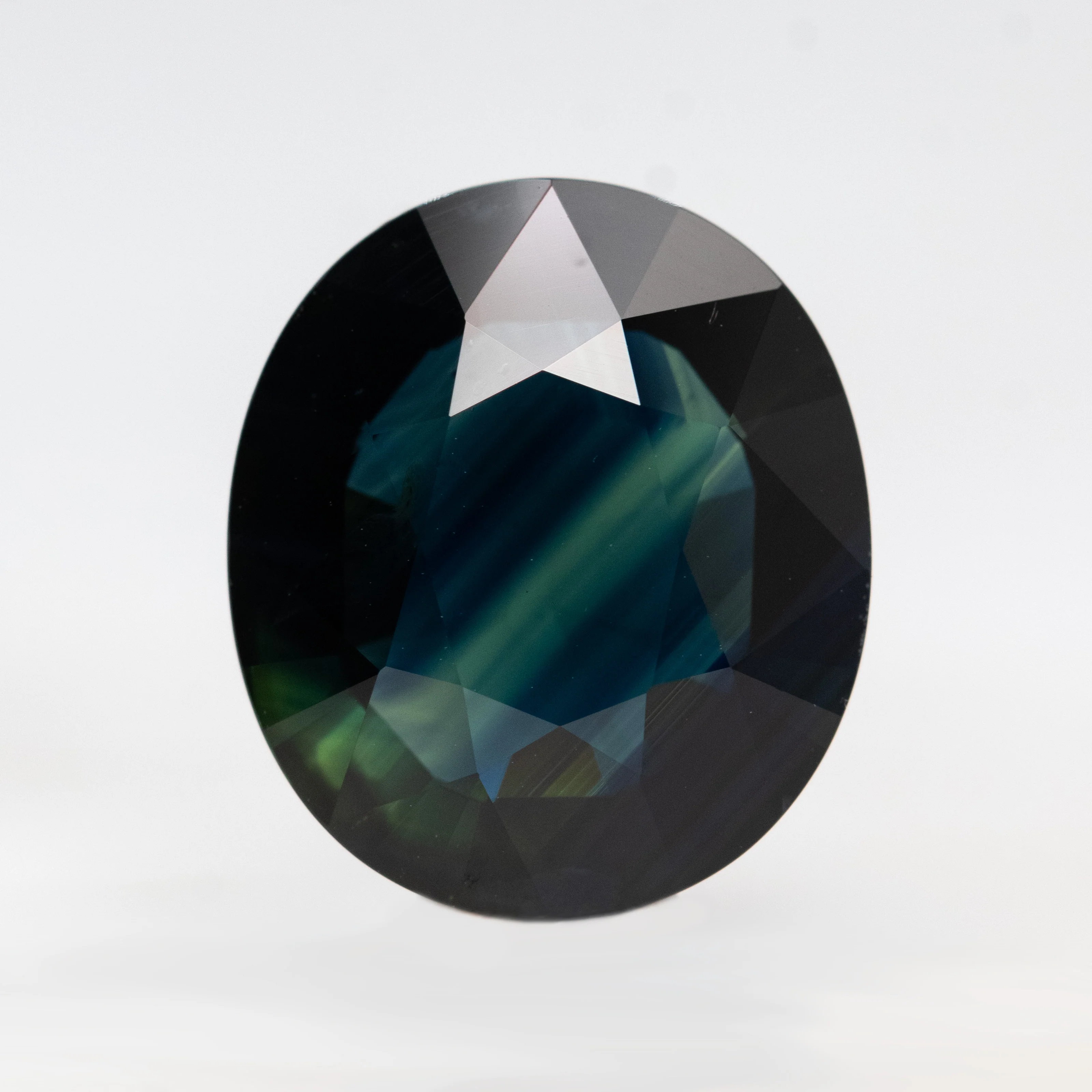 6.15 Carat Dark Teal Oval Sapphire for Custom Work - Inventory Code TOS615