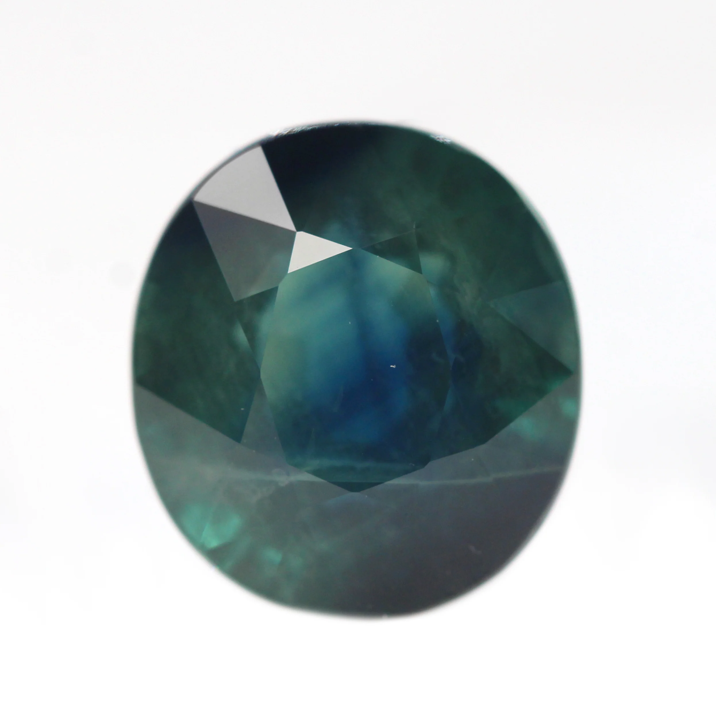 6.70 Carat Dark Teal Oval Sapphire for Custom Work - Inventory Code TOS670