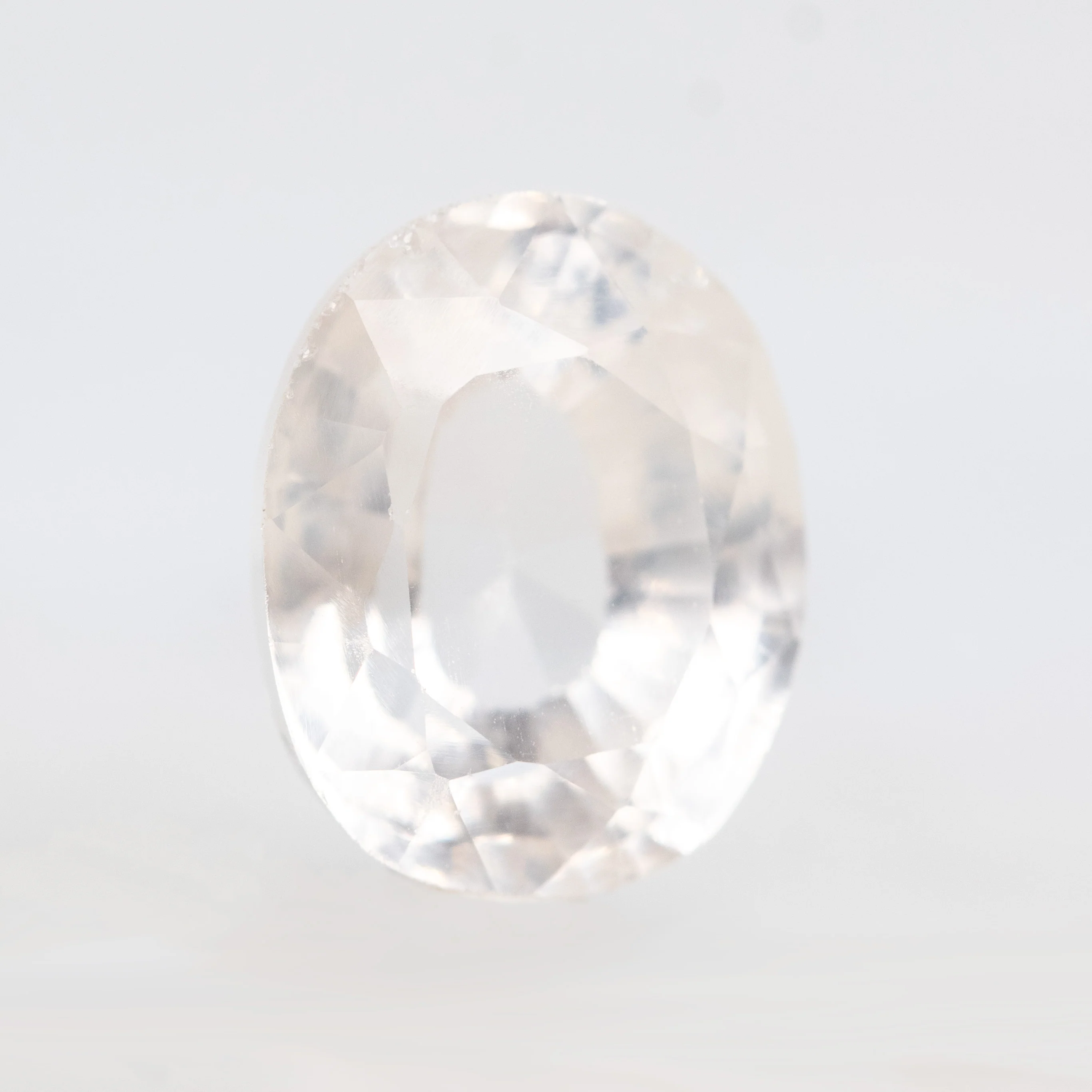 7.28 Carat Clear Oval Lab Grown Sapphire for Custom Work - Inventory Code COS728 - Image 4
