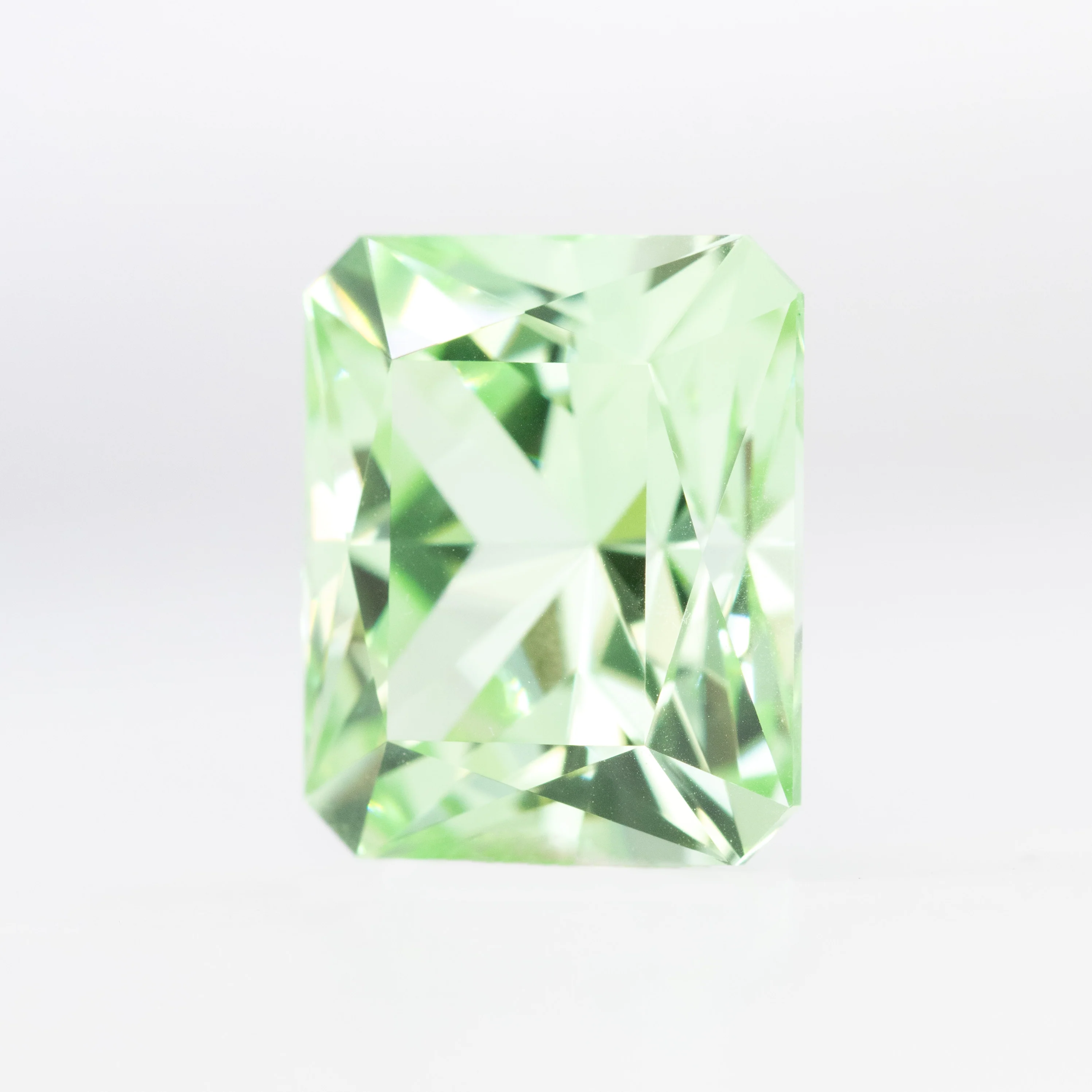 9.41 Carat Light Green Lab Grown Sapphire for Custom Work - Inventory Code LGCS941 - Image 3