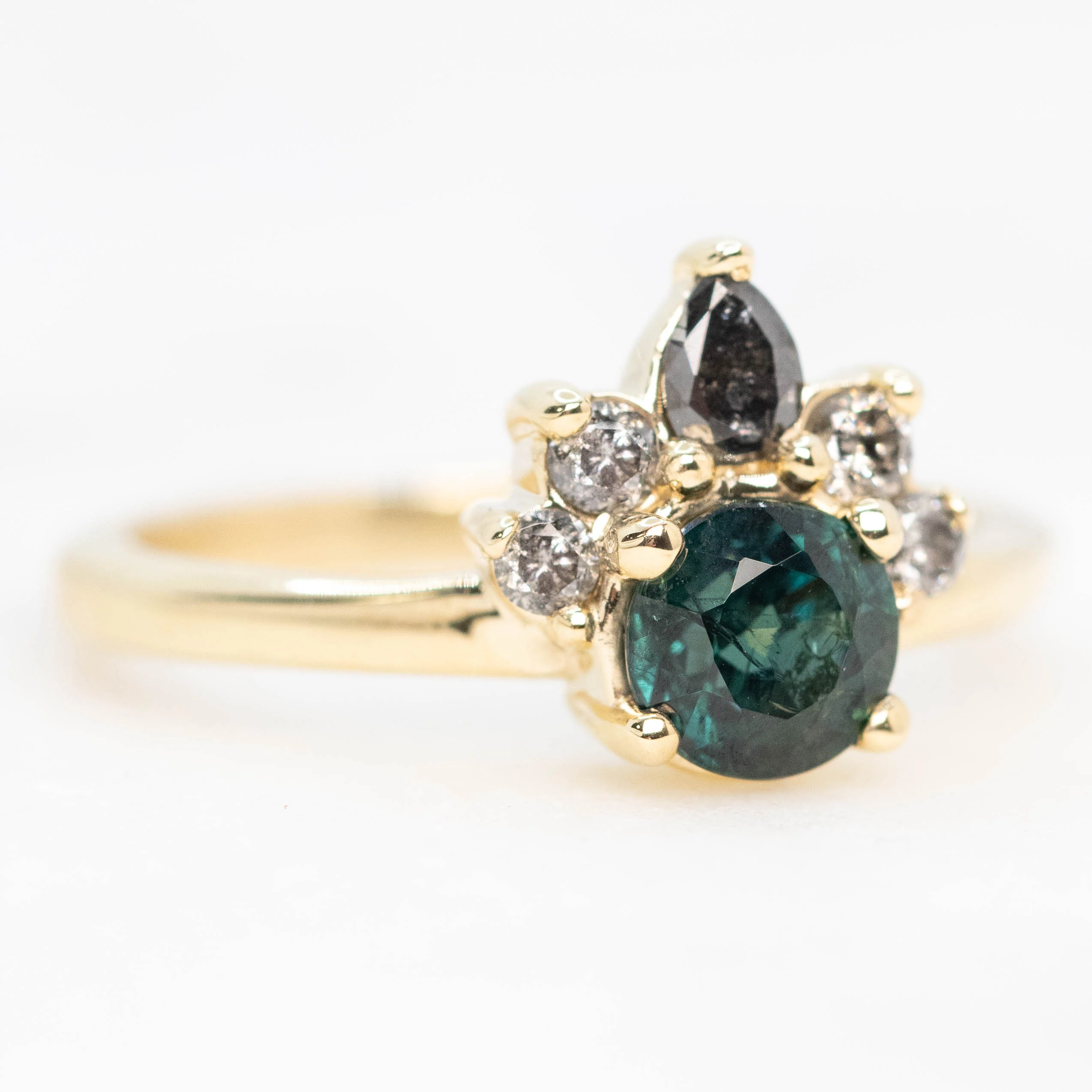 Blair Ring with a 1.09 Carat Round Teal Green Sapphire and Gray and Black Accent Diamonds in 10k Yellow Gold - Ready to Size and Ship - Image 4