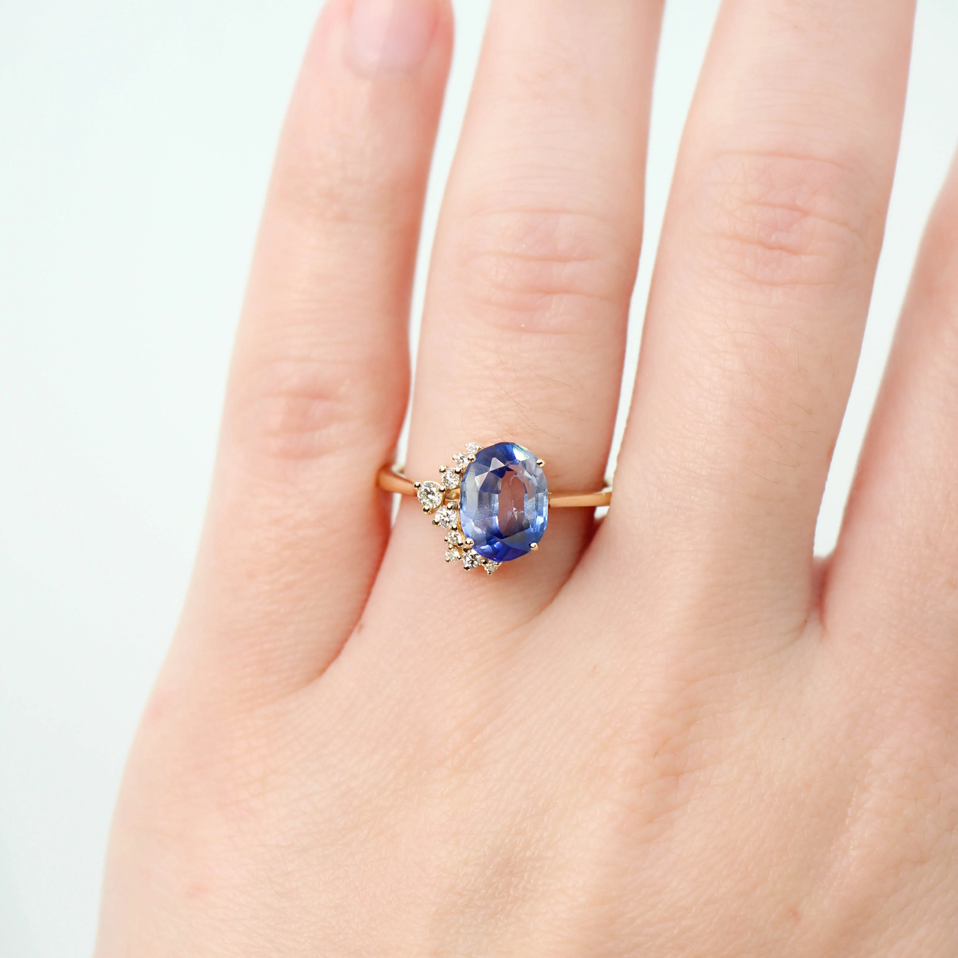 Project: Custom Anila Ring with a 2.5+ Carat Oval Blue Sapphire and White Accent Diamonds in 14k - Image 3