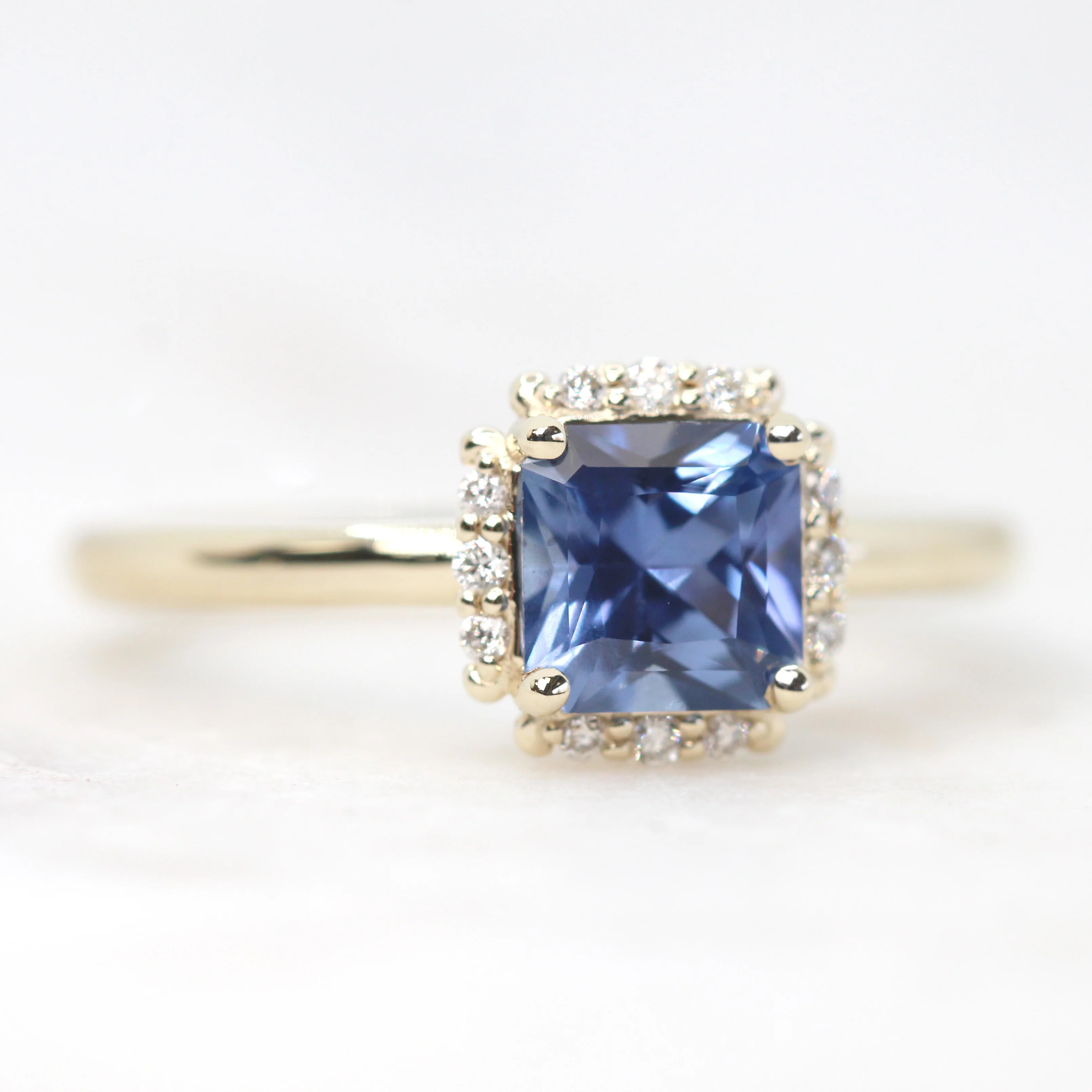 Astrid Ring with a 1.08 Carat Radiant Cut Blue Sapphire and White Accent Diamonds in 10k Yellow Gold - Ready to Size and Ship - Image 4