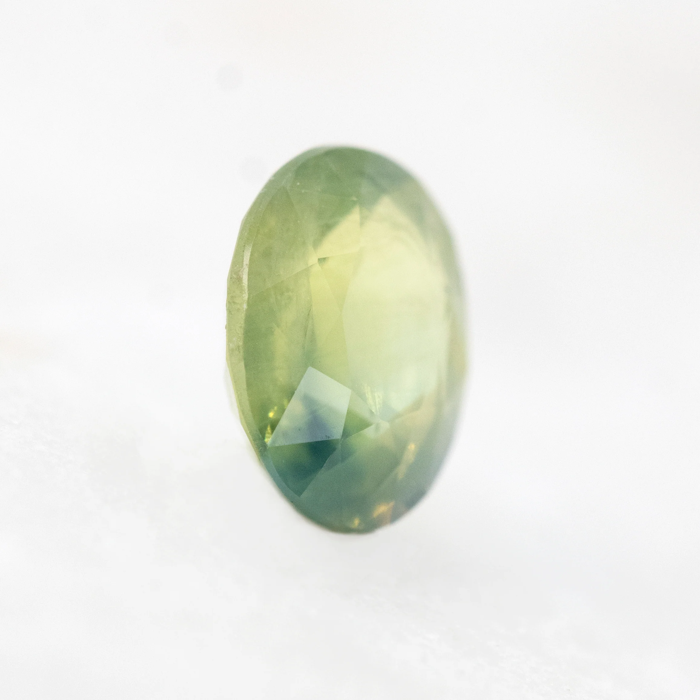 1.39 Carat Light Green Bicolor Oval Sapphire for Custom Work - Inventory Code GBOS139 - Image 3