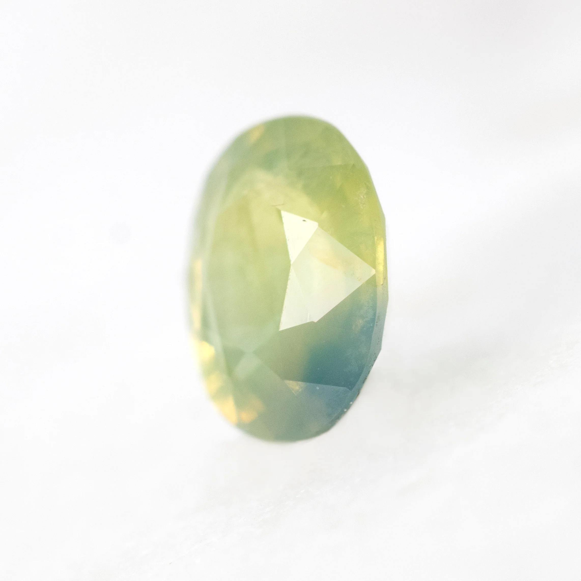 1.39 Carat Light Green Bicolor Oval Sapphire for Custom Work - Inventory Code GBOS139 - Image 4