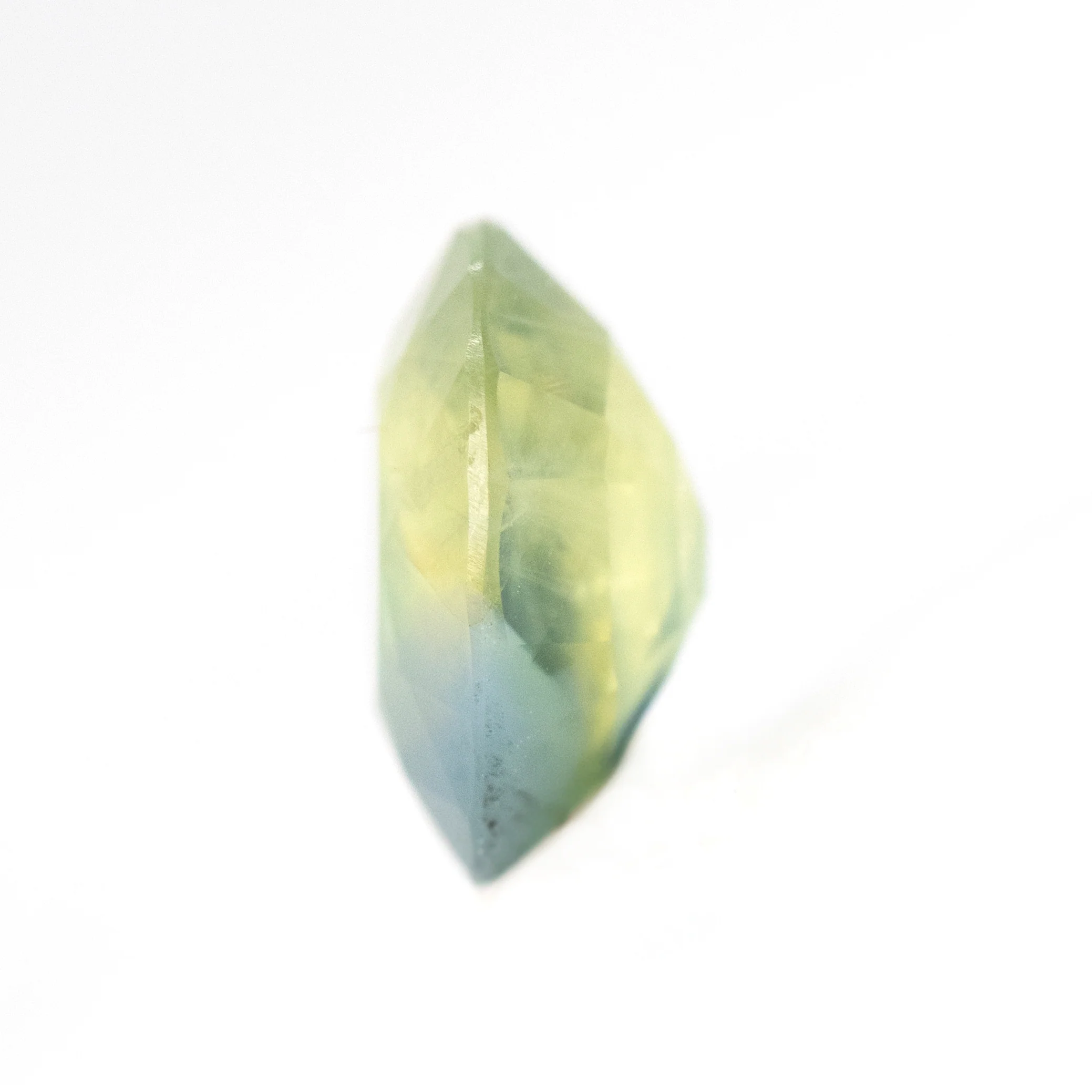 1.39 Carat Light Green Bicolor Oval Sapphire for Custom Work - Inventory Code GBOS139 - Image 5