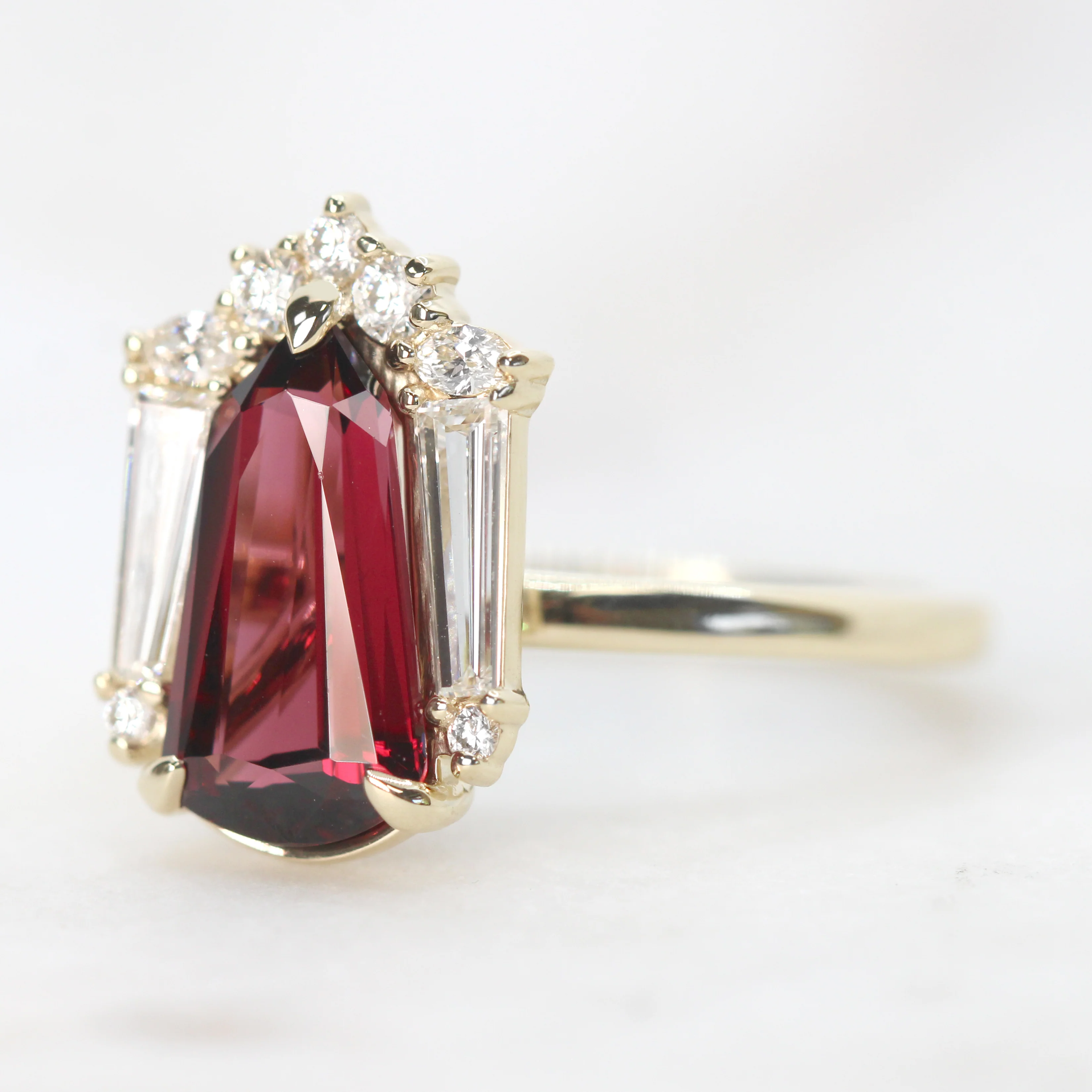 Project: Custom Christine Ring with a 2.5 Carat Shield Cut Garnet and White Accent Diamonds in 14k - Image 10