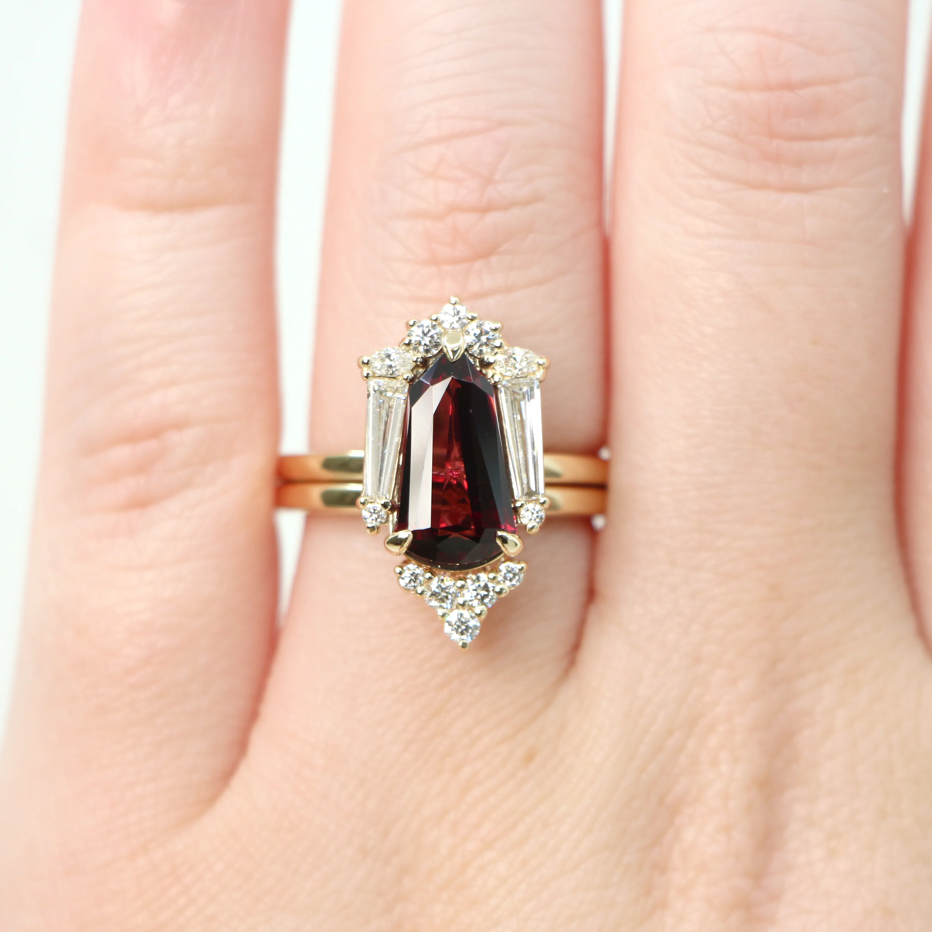 Project: Custom Christine Ring with a 2.5 Carat Shield Cut Garnet and White Accent Diamonds in 14k - Image 4