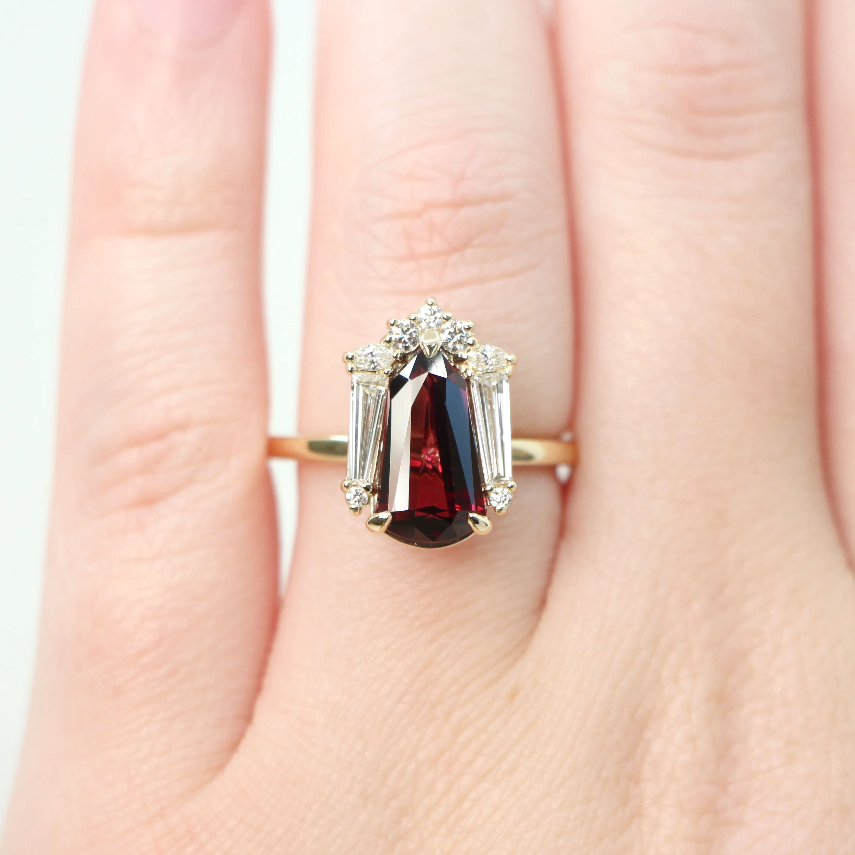 Project: Custom Christine Ring with a 2.5 Carat Shield Cut Garnet and White Accent Diamonds in 14k - Image 8
