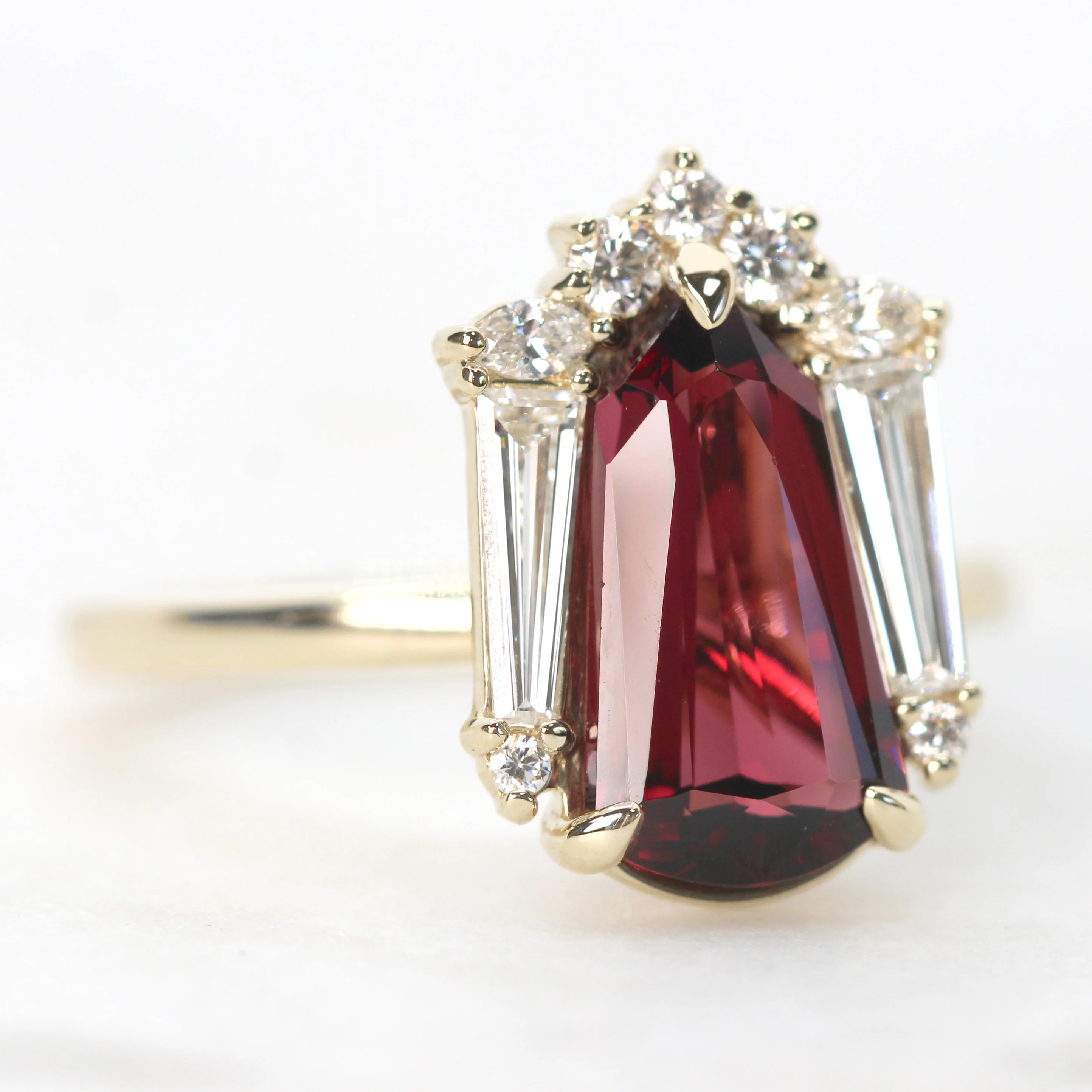 Project: Custom Christine Ring with a 2.5 Carat Shield Cut Garnet and White Accent Diamonds in 14k - Image 9