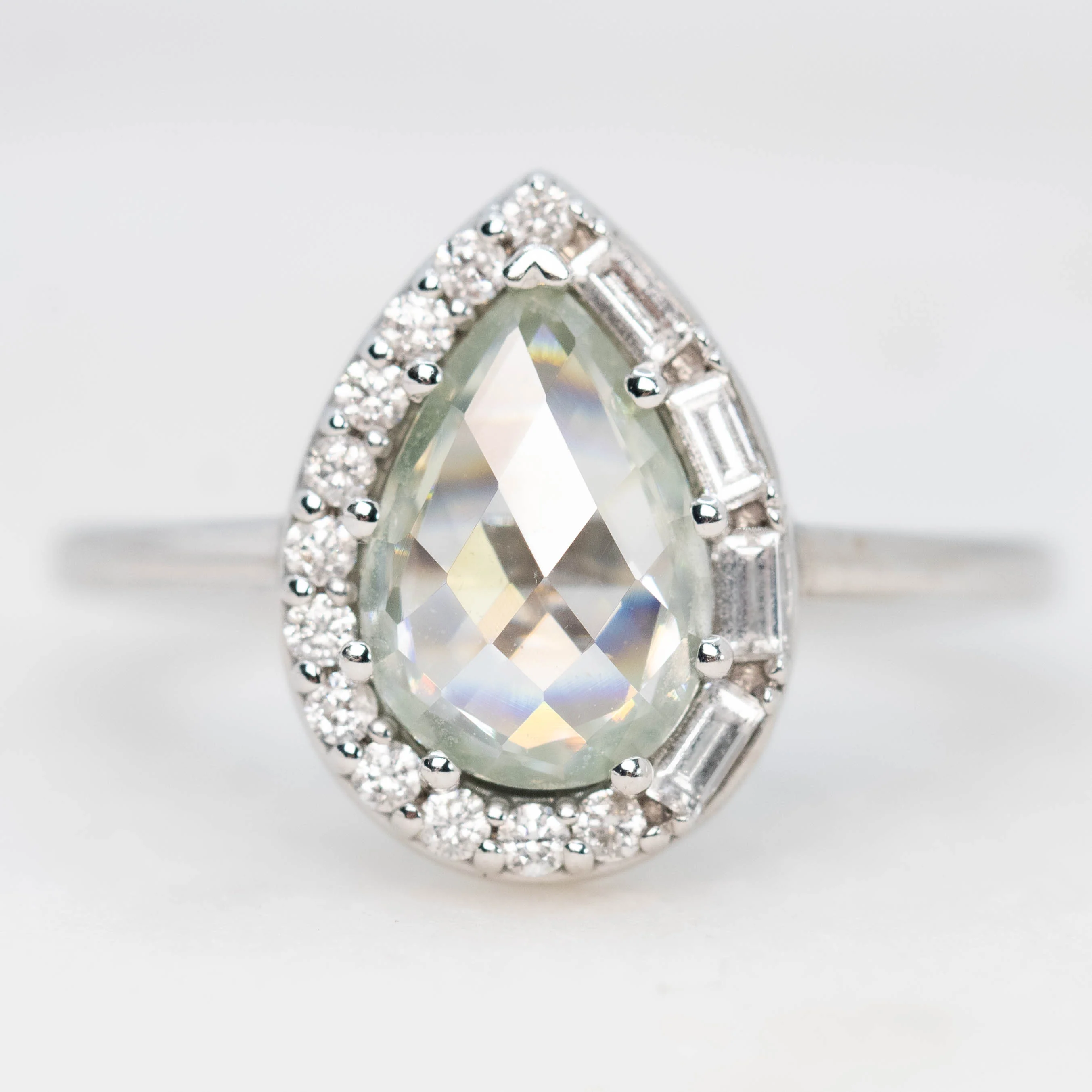 Collins Ring with a 1.00 Carat Clear Pear Moissanite and White Accent Diamonds in 10k White Gold - Ready to Size and Ship