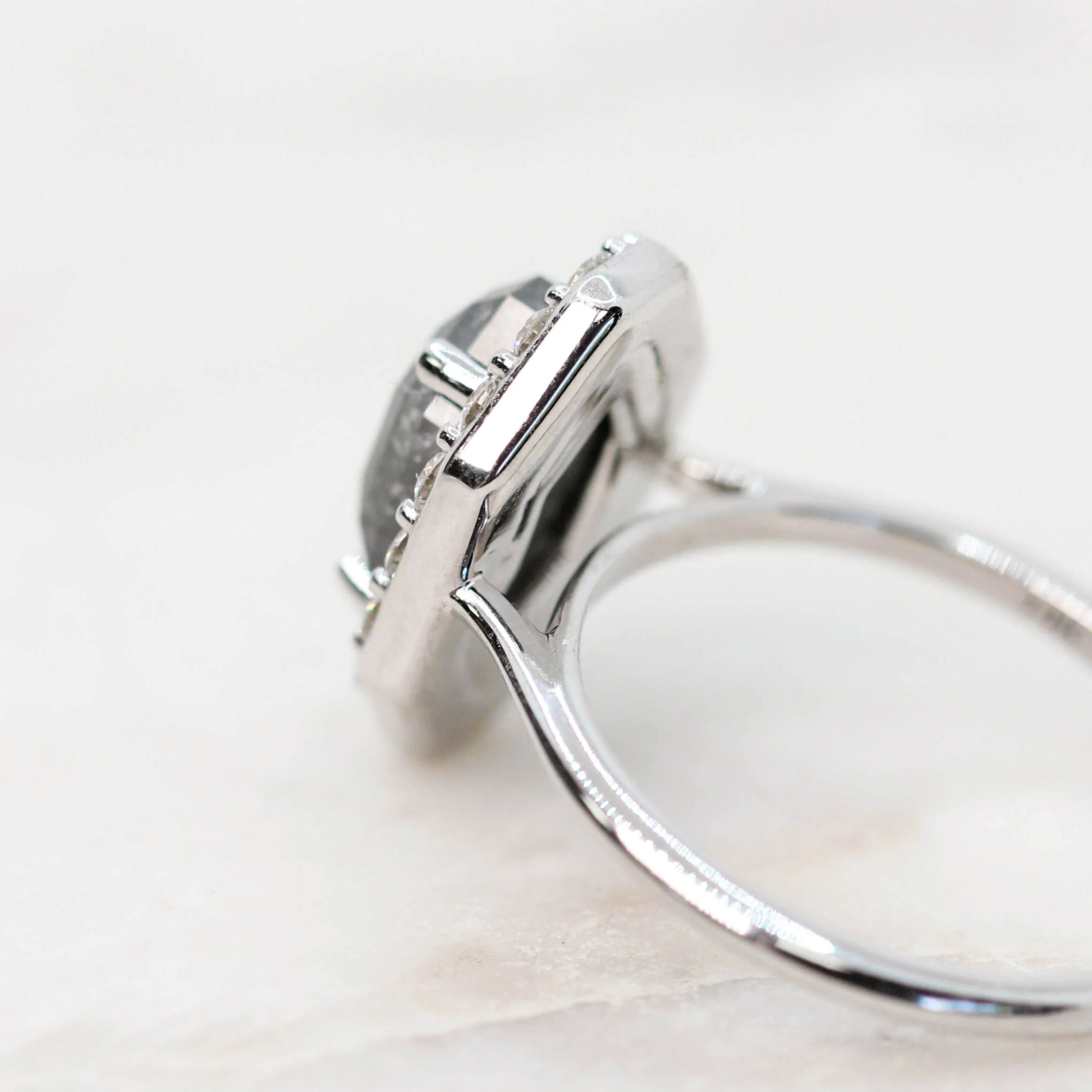 Project: Custom Collins Ring with a 2.5 Carat Black Salt and Pepper Octagon Diamond and White Accent Diamonds in 14k - Image 7