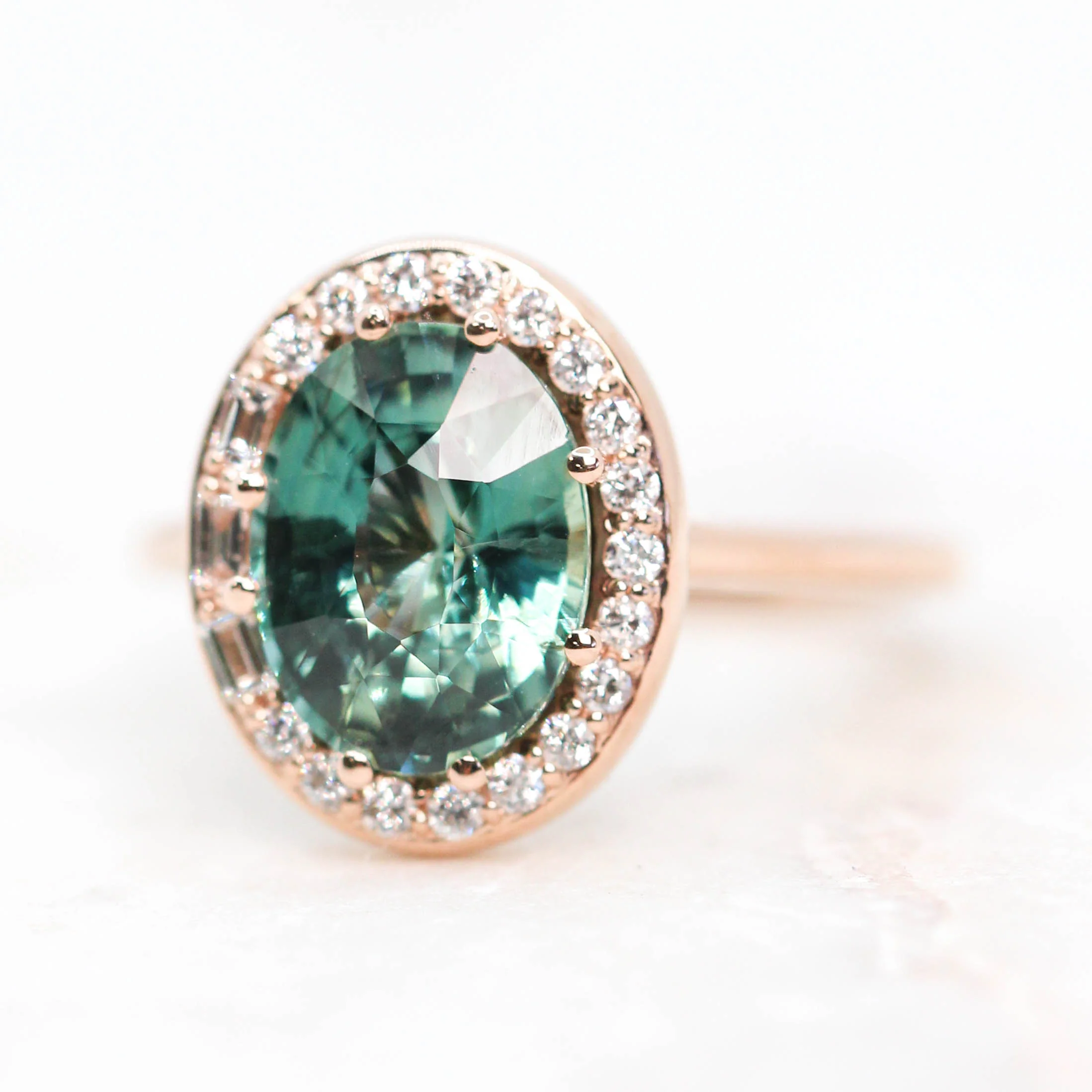 Project: Custom Collins Ring with a 3 Carat Teal Sapphire and White Accent Diamonds in 14k - Image 4