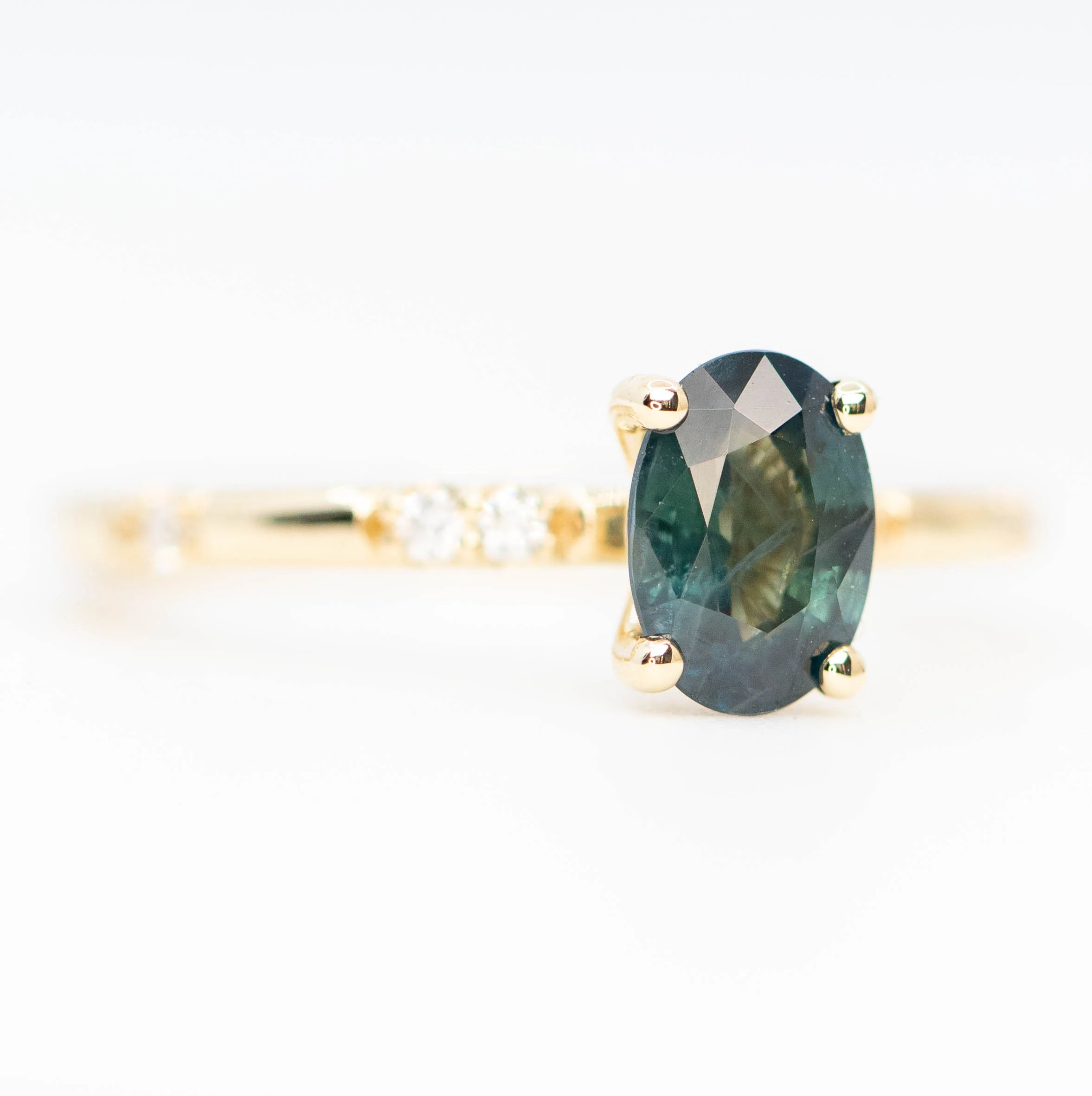 Estelle Ring with a 1.03 Carat Teal Oval Sapphire and White Accent Diamonds in 14k Yellow Gold - Ready to Size and Ship - Image 4