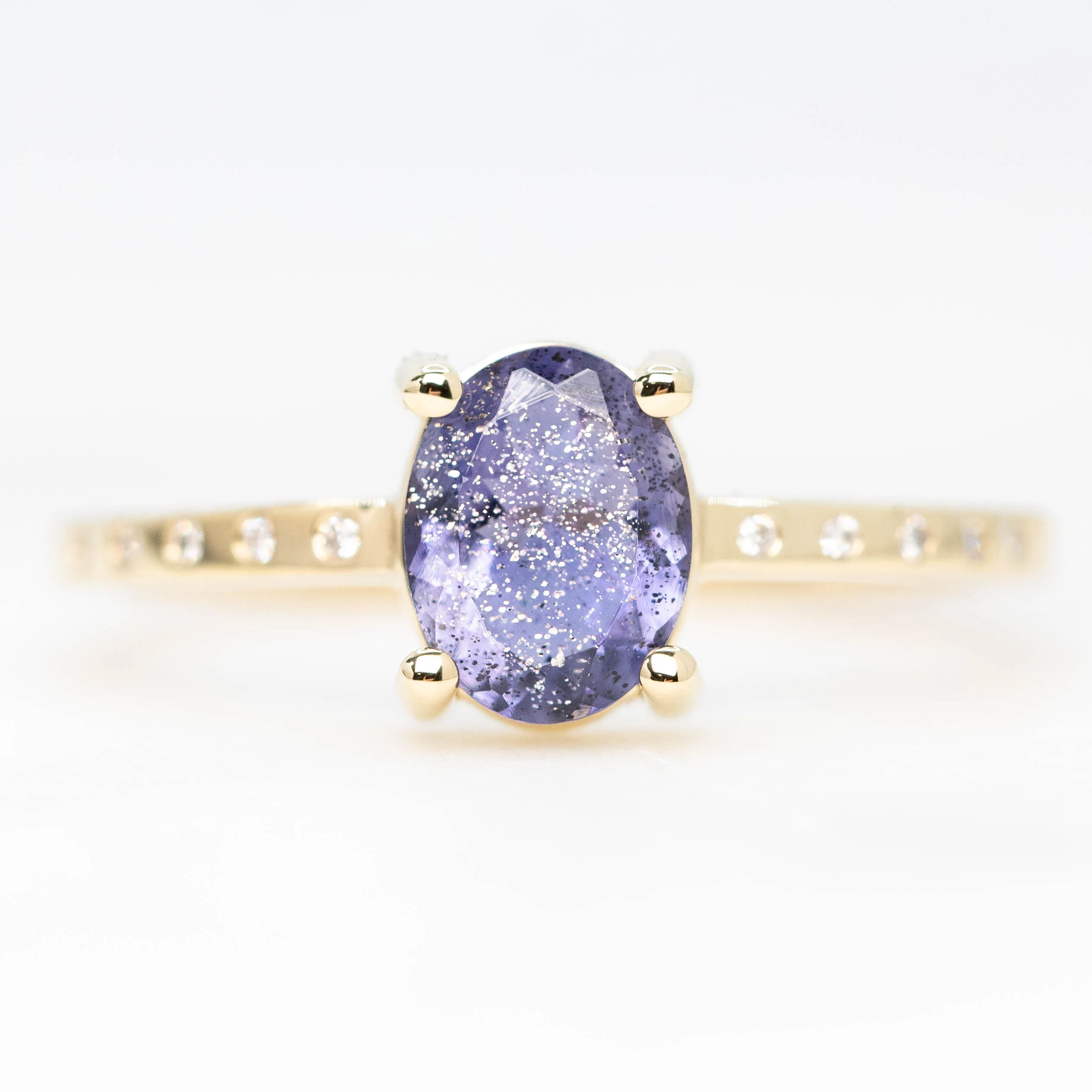 Heath Ring with a 0.74 Carat Oval Iolite and White Accent Diamonds in 14k Yellow Gold - Ready to Size and Ship