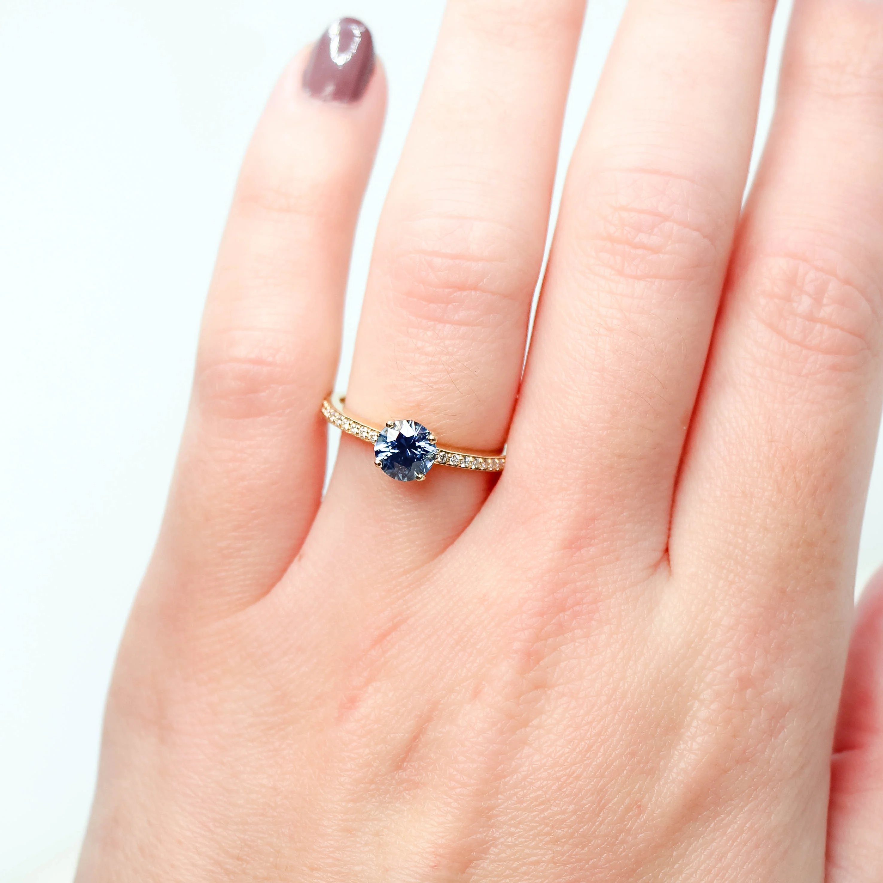 Imani Ring with a 0.96 Carat Round Blue Sapphire and White Accent Diamonds in 14k Yellow Gold - Ready to Size and Ship - Image 2