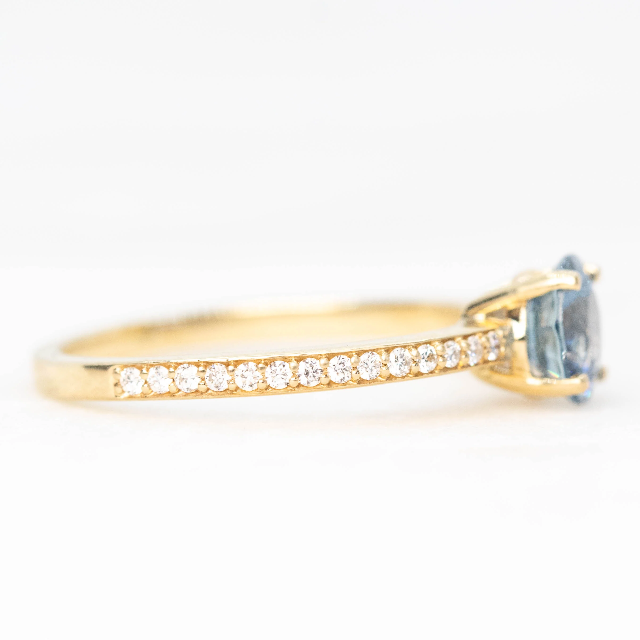 Imani Ring with a 0.96 Carat Round Blue Sapphire and White Accent Diamonds in 14k Yellow Gold - Ready to Size and Ship - Image 5