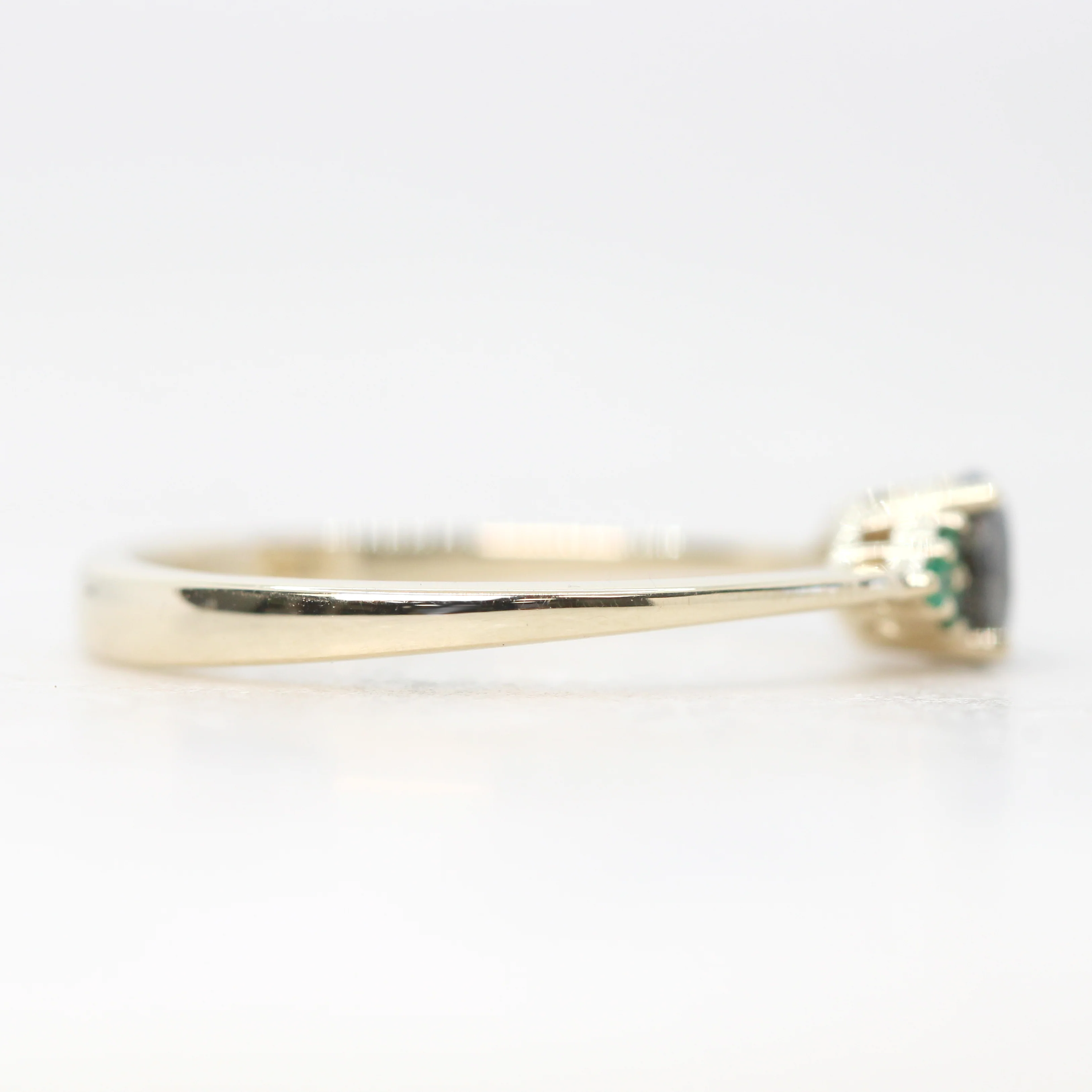 Project: Custom Imogene Ring with a 0.50 Carat Round Dark Gray Black Salt and Pepper Diamond and Emerald Accents in 14k - Image 6
