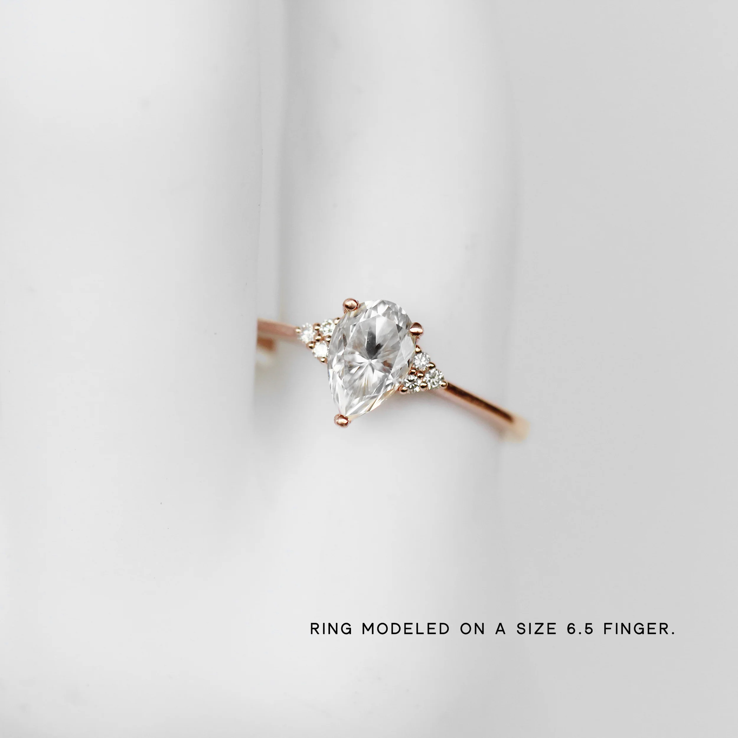 Imogene Ring with a Pear Moissanite and White Accent Diamonds - Made to Order - Image 5