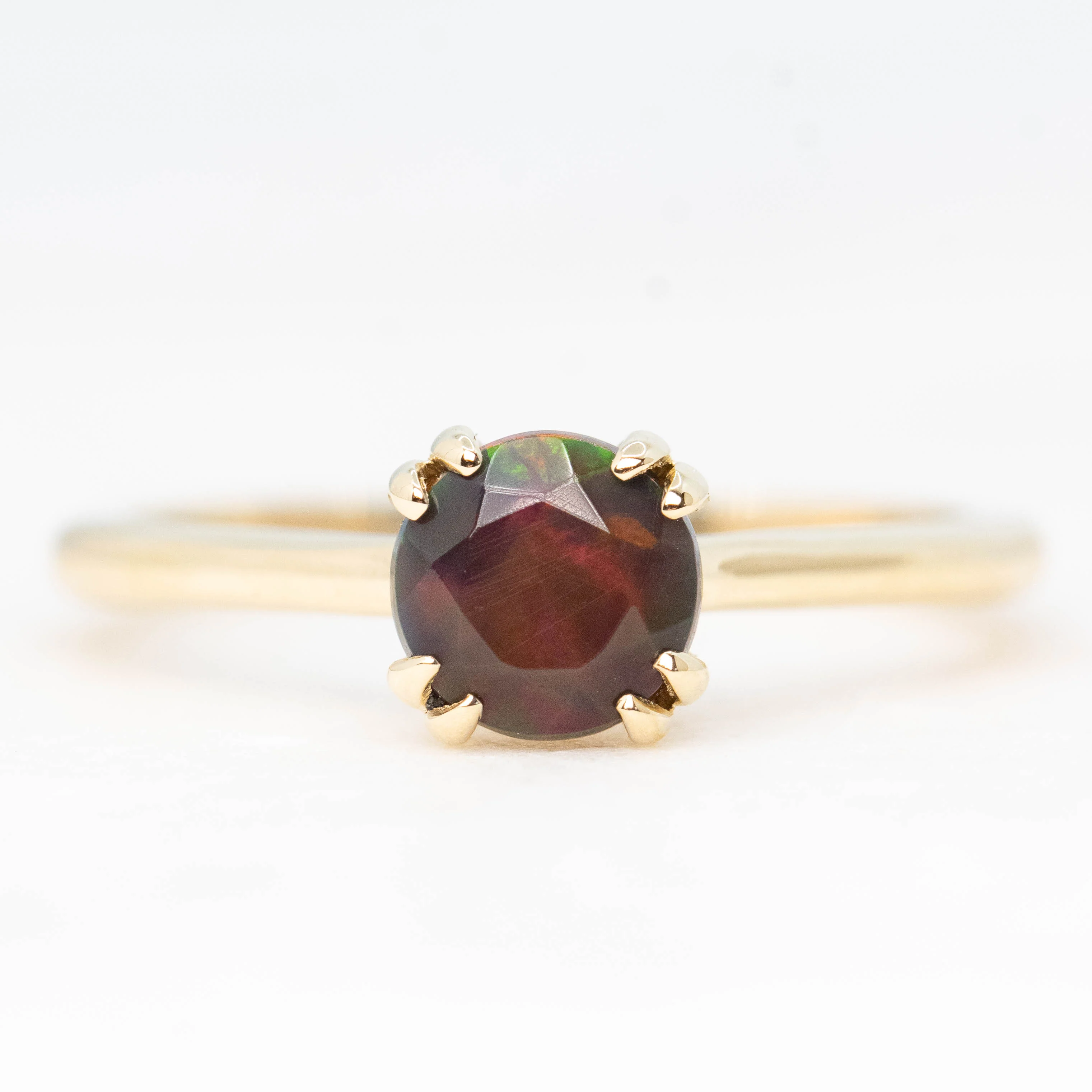 Nesta Ring with a 0.65 Carat Black Opal in 14k Yellow Gold - Ready to Size and Ship