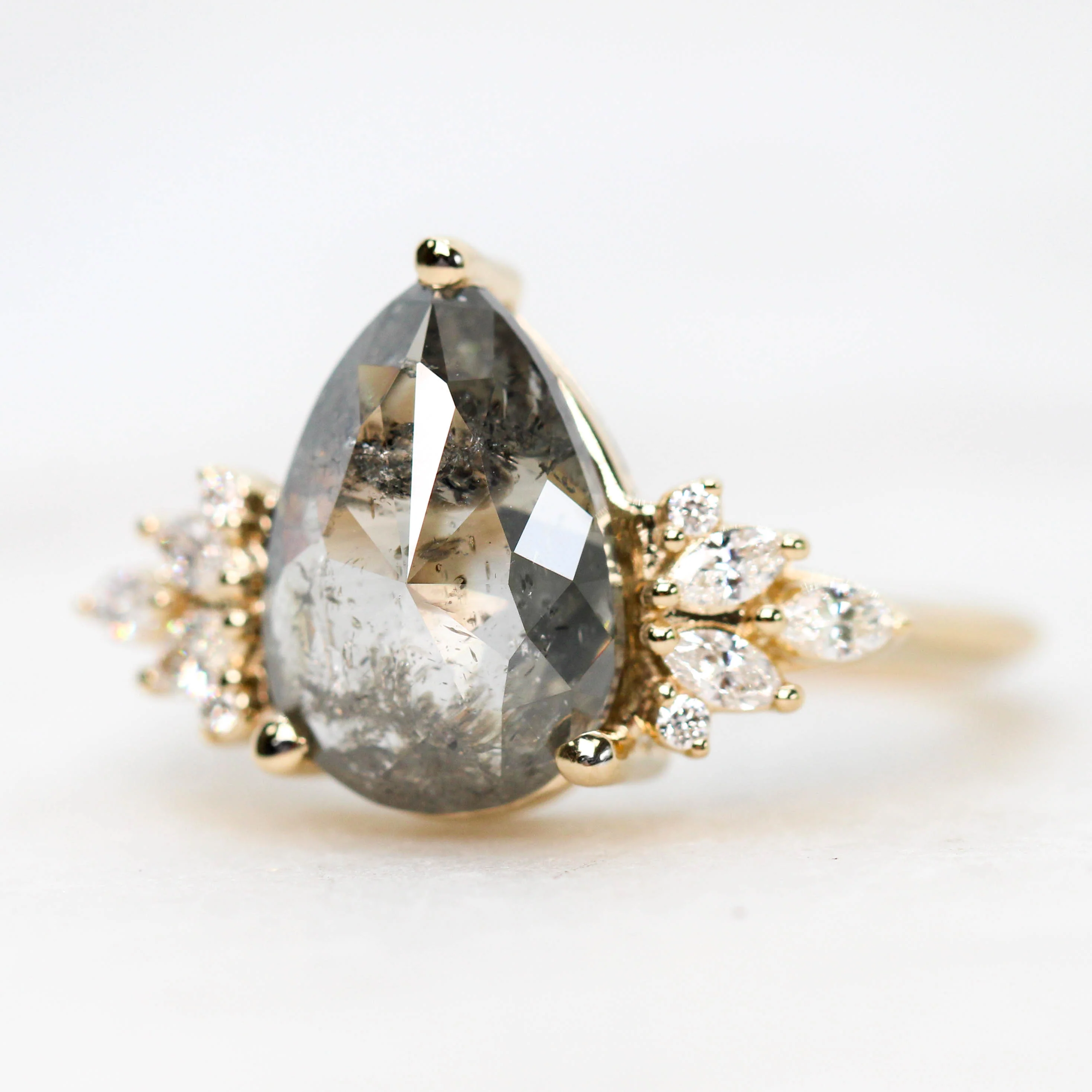 Project: Custom Odette Ring with a 3 Carat Dark and Clear Pear Salt and Pepper Diamond and White Accent Diamonds in 14k - Image 4