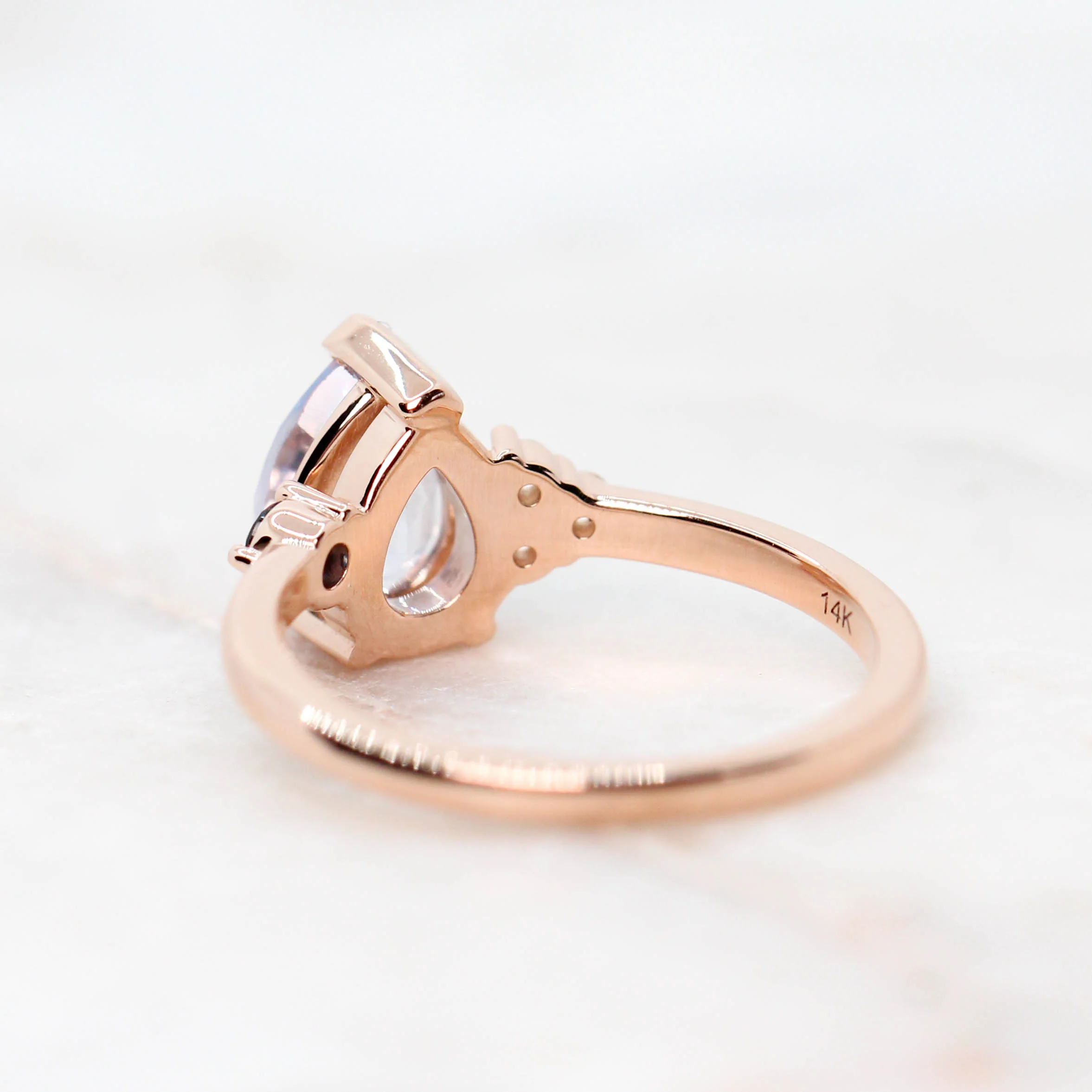 Project: Custom Fletcher Ring with a 2 Carat Blue Pear Sapphire with White and Blue Sapphire Accents in 14k - Image 11