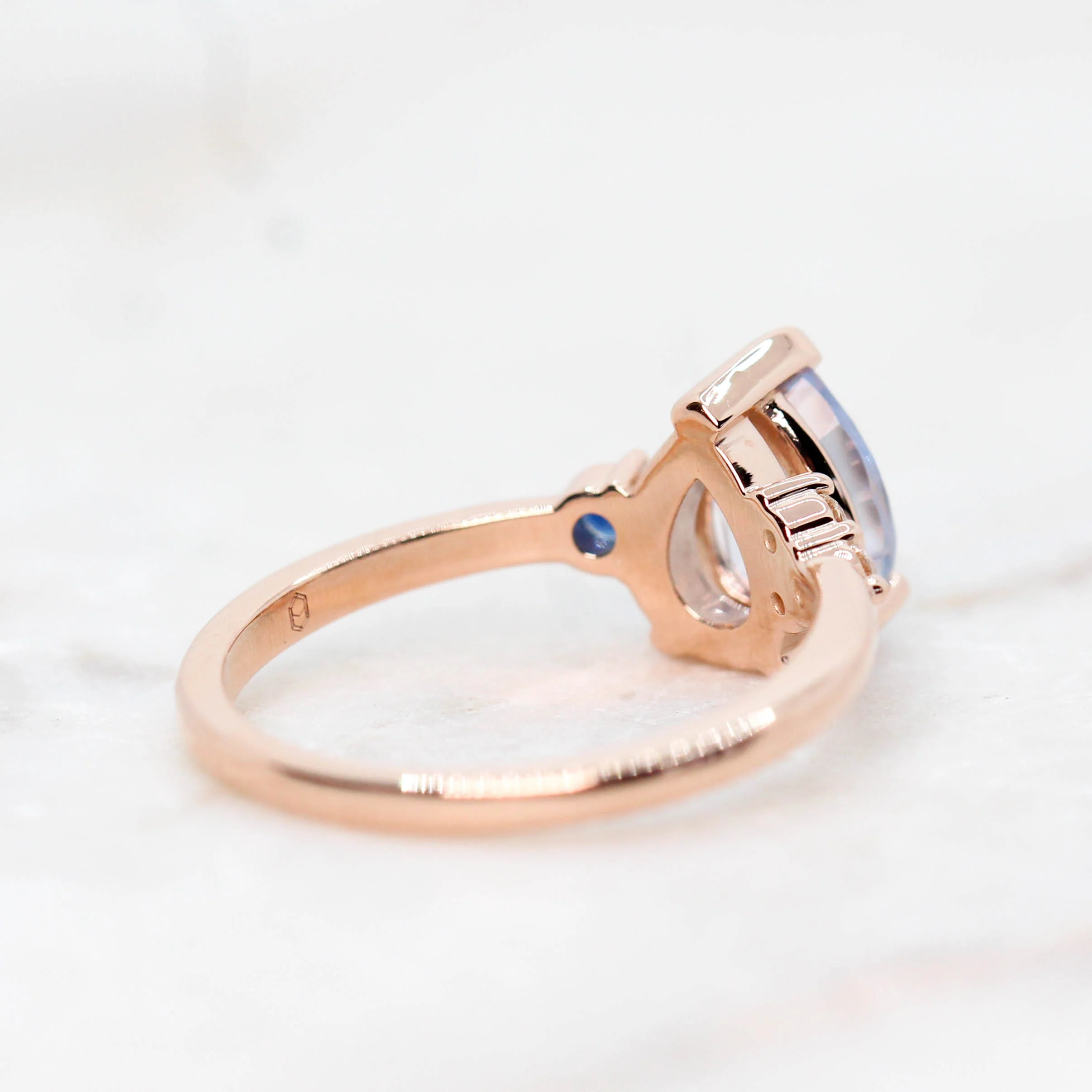 Project: Custom Fletcher Ring with a 2 Carat Blue Pear Sapphire with White and Blue Sapphire Accents in 14k - Image 9