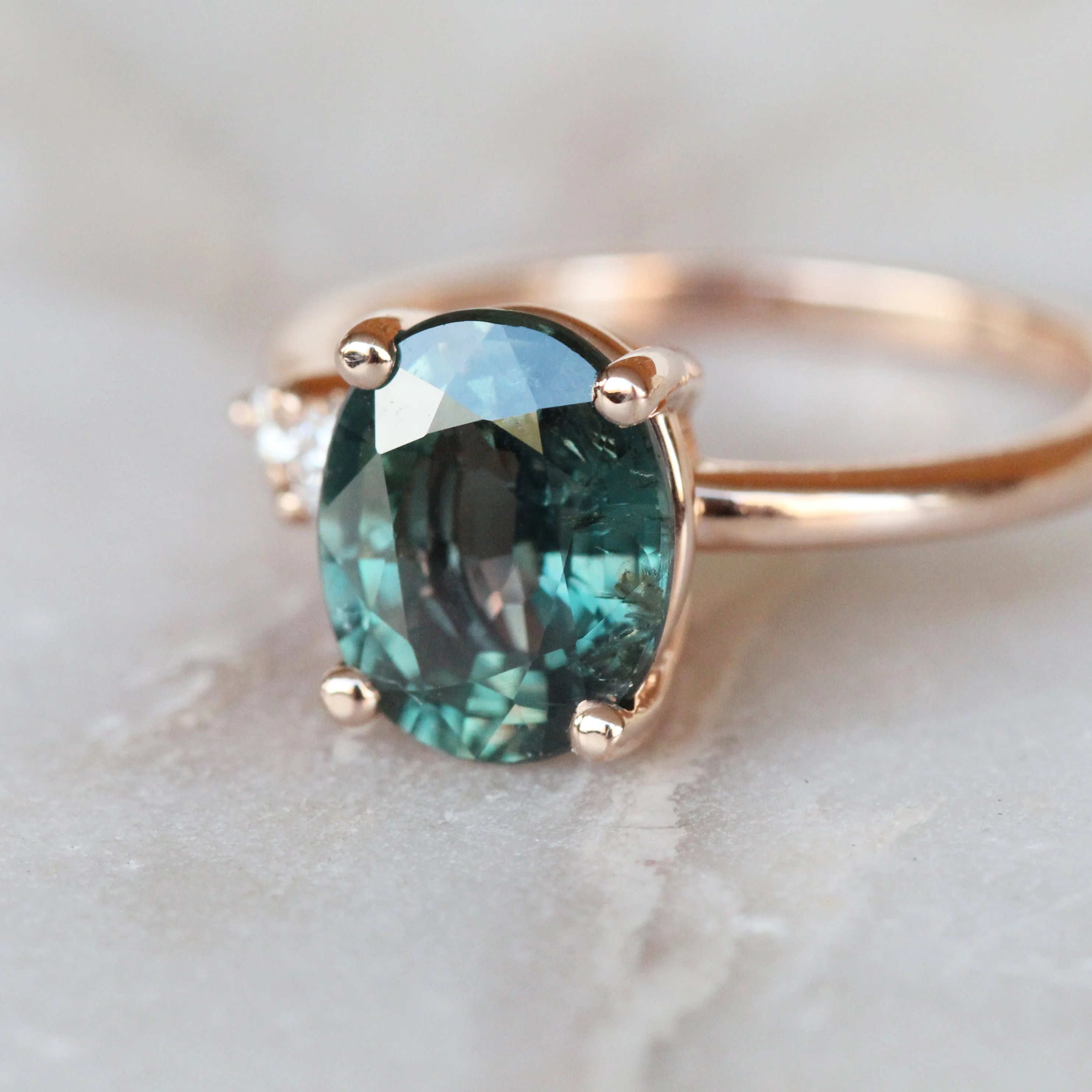 Project: Custom Jesse Ring with 3 Carat Teal Blue Sapphire with Asymmetrical Accent Diamonds in 14k - Image 7
