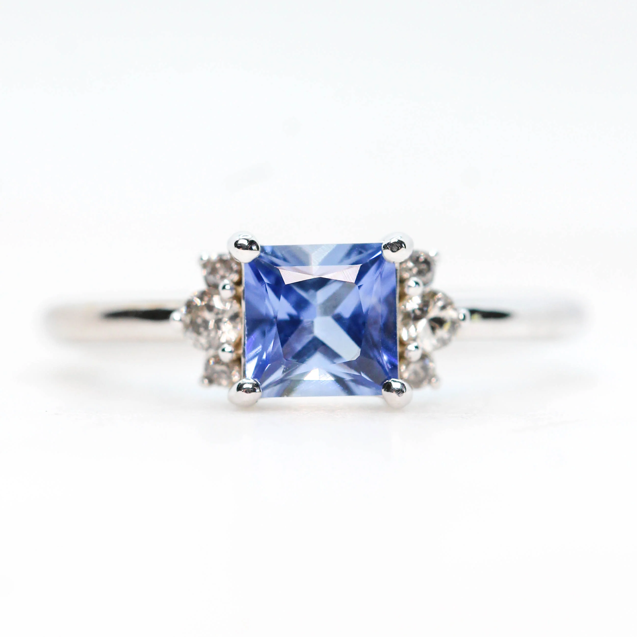 Project: Custom Loren Ring with a 1 Carat Princess Cut Blue Sapphire and White Accent Diamonds in 14k