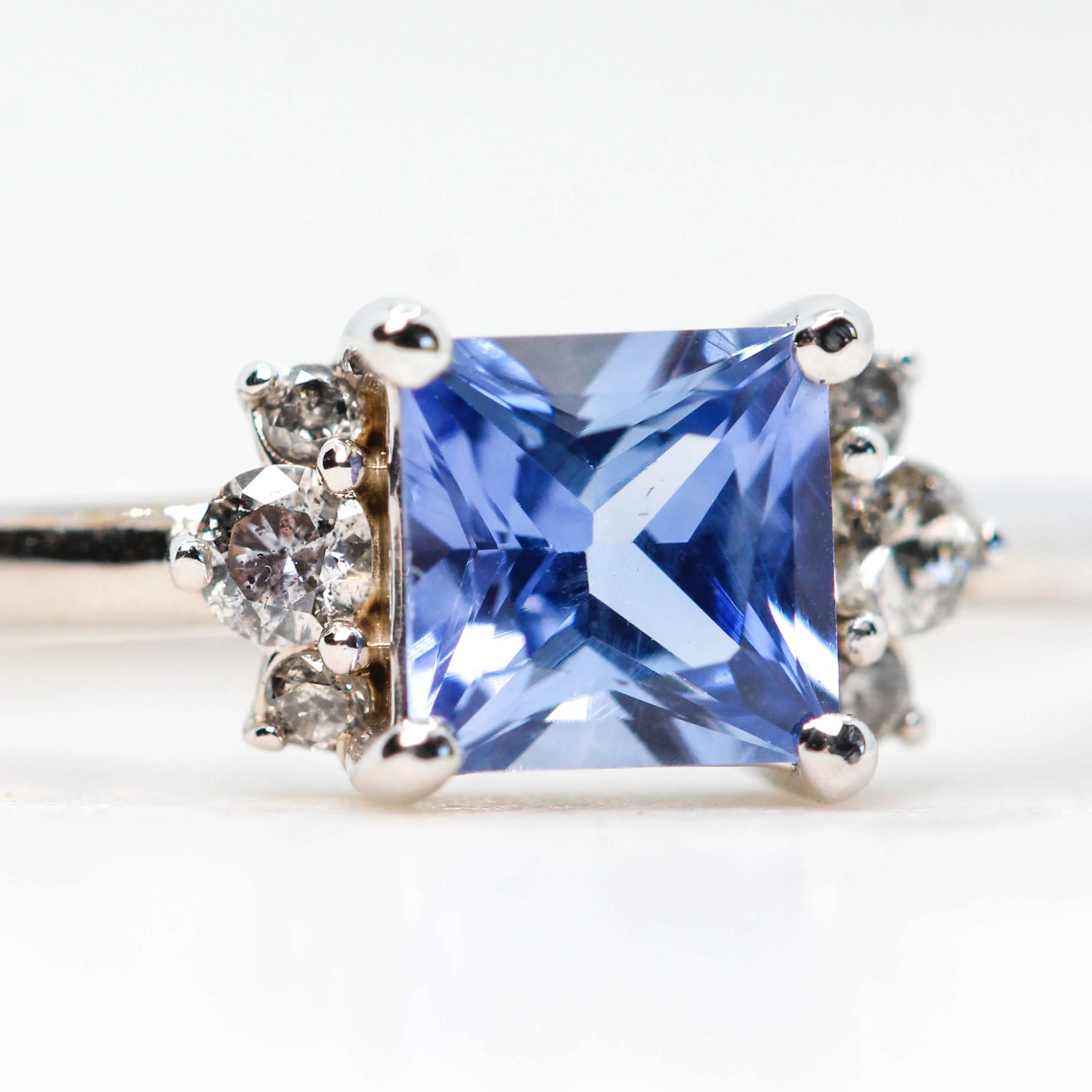 Project: Custom Loren Ring with a 1 Carat Princess Cut Blue Sapphire and White Accent Diamonds in 14k - Image 4