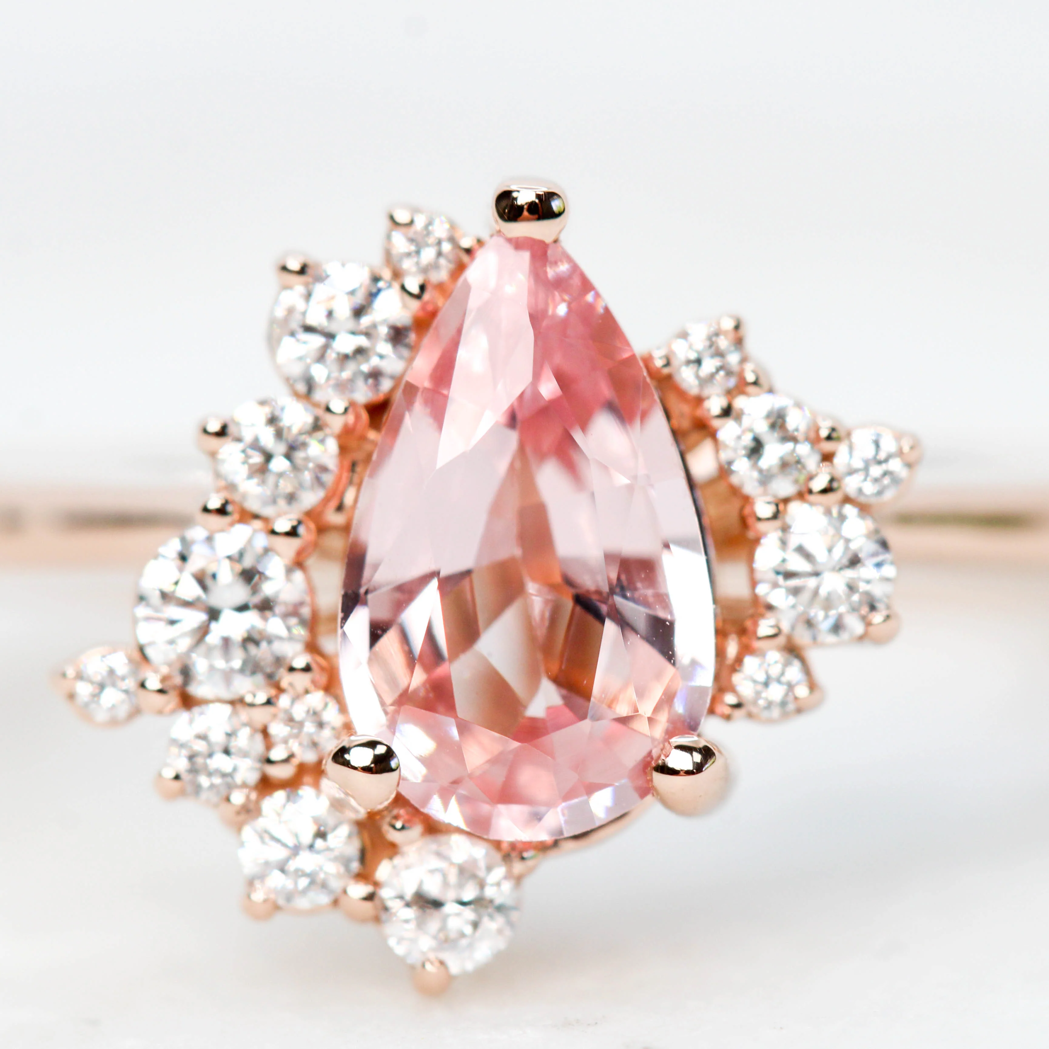 Project: Custom Orion Ring with 1 Carat Pink Pear Sapphire and White Diamond Accents in 14k - Image 4