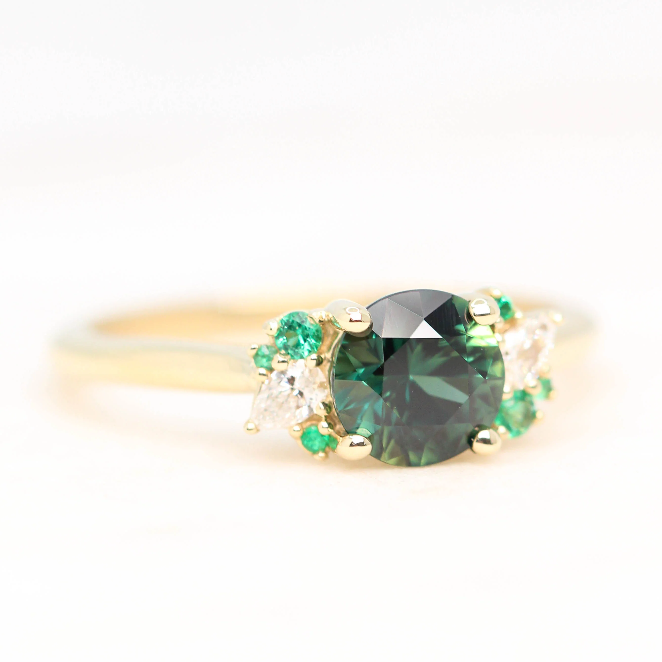 Project: Custom Sable Ring with a 1.5 Carat Round Sapphire with Emerald and Diamond Accents in 14k - Image 5