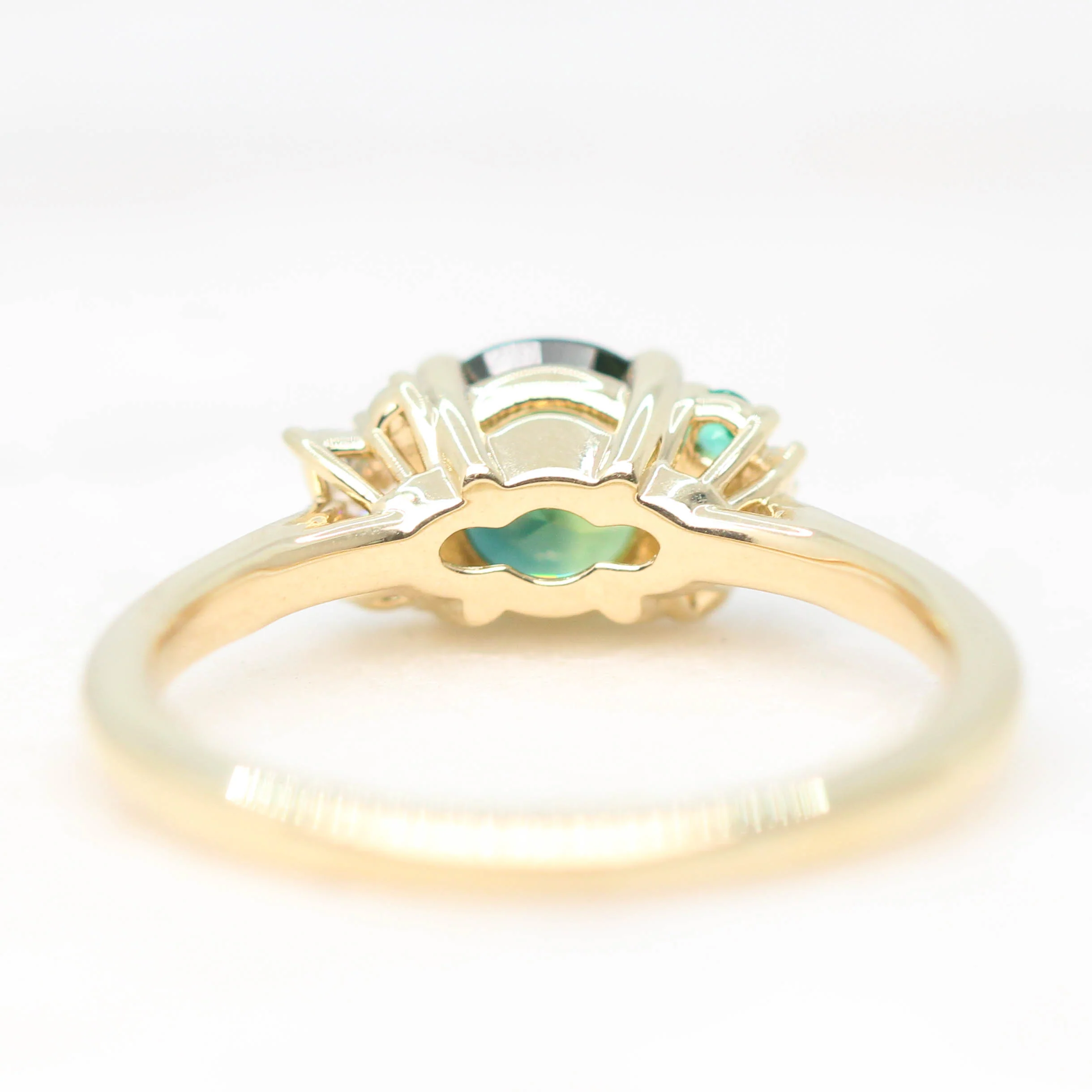 Project: Custom Sable Ring with a 1.5 Carat Round Sapphire with Emerald and Diamond Accents in 14k - Image 7