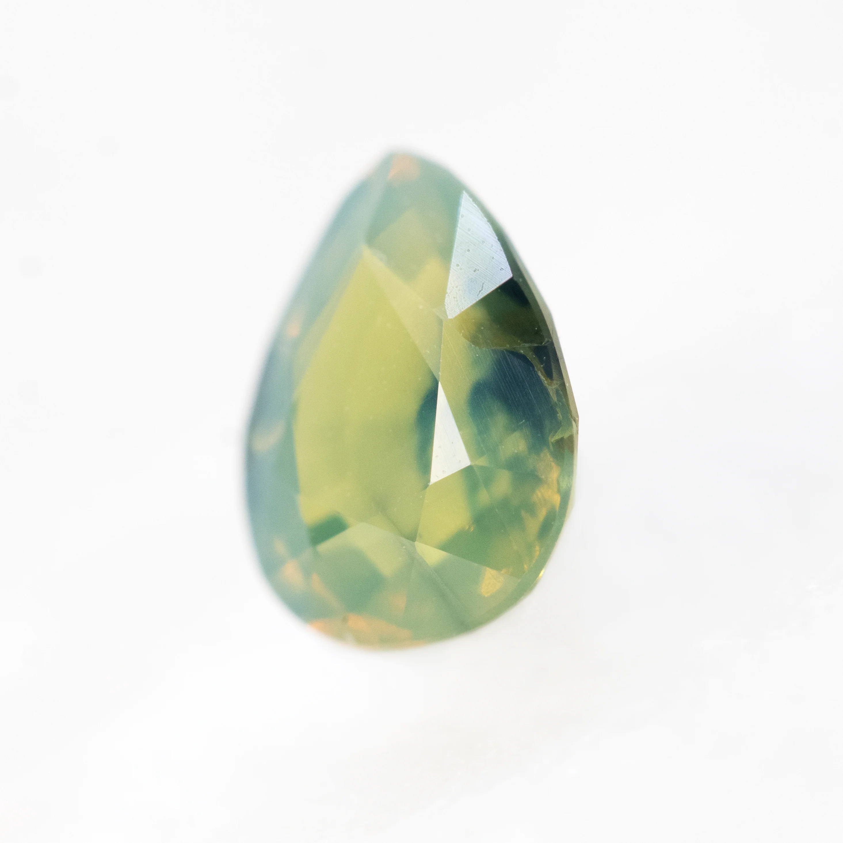 0.91 Carat Bicolor Teal Pear Sapphire for Custom Work - Inventory Code BTSP091 - Image 3