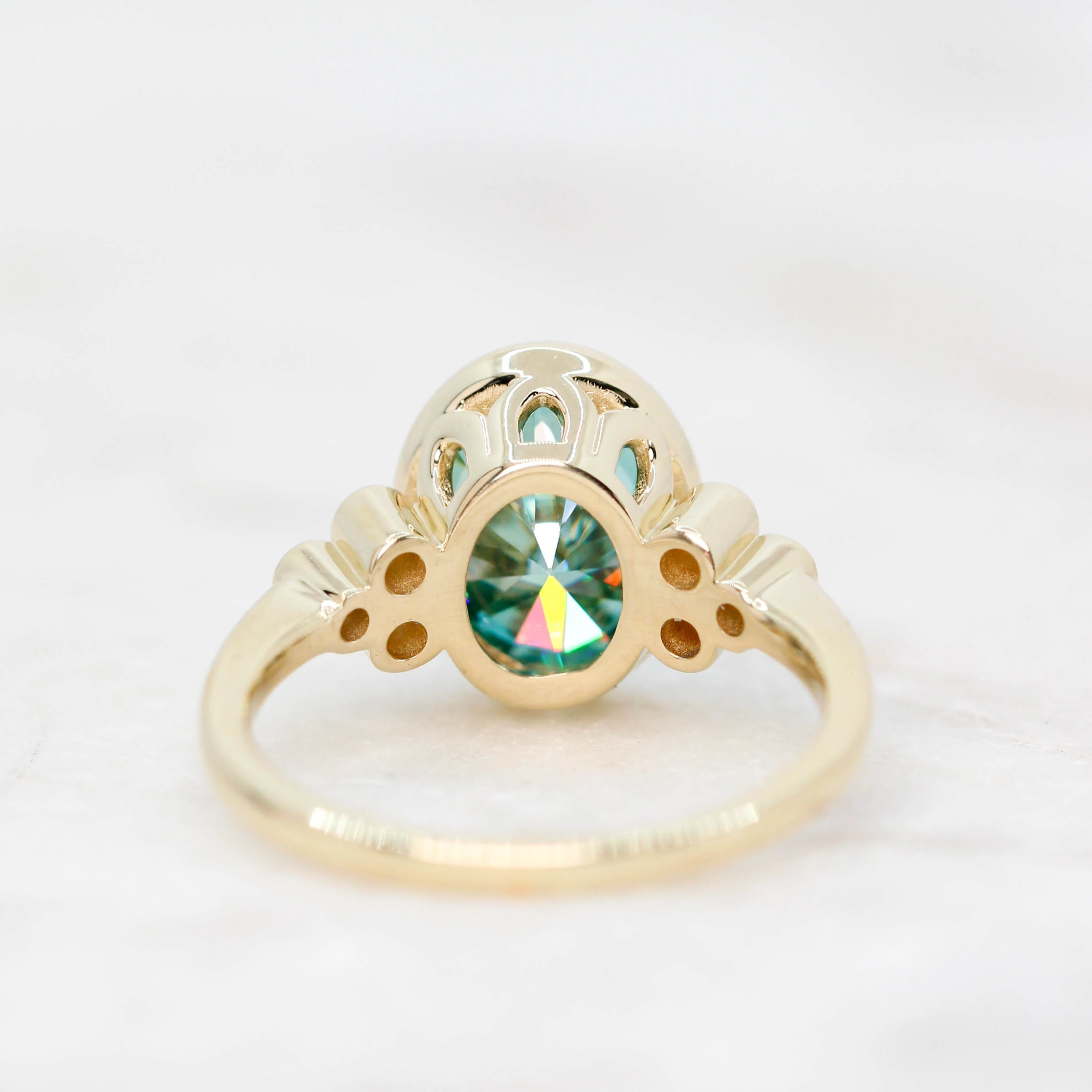 Project: Custom Sophia Ring with a 2.5 Carat Bezel Set Teal Oval Moissanite and Accent Diamonds in 14k - Image 7