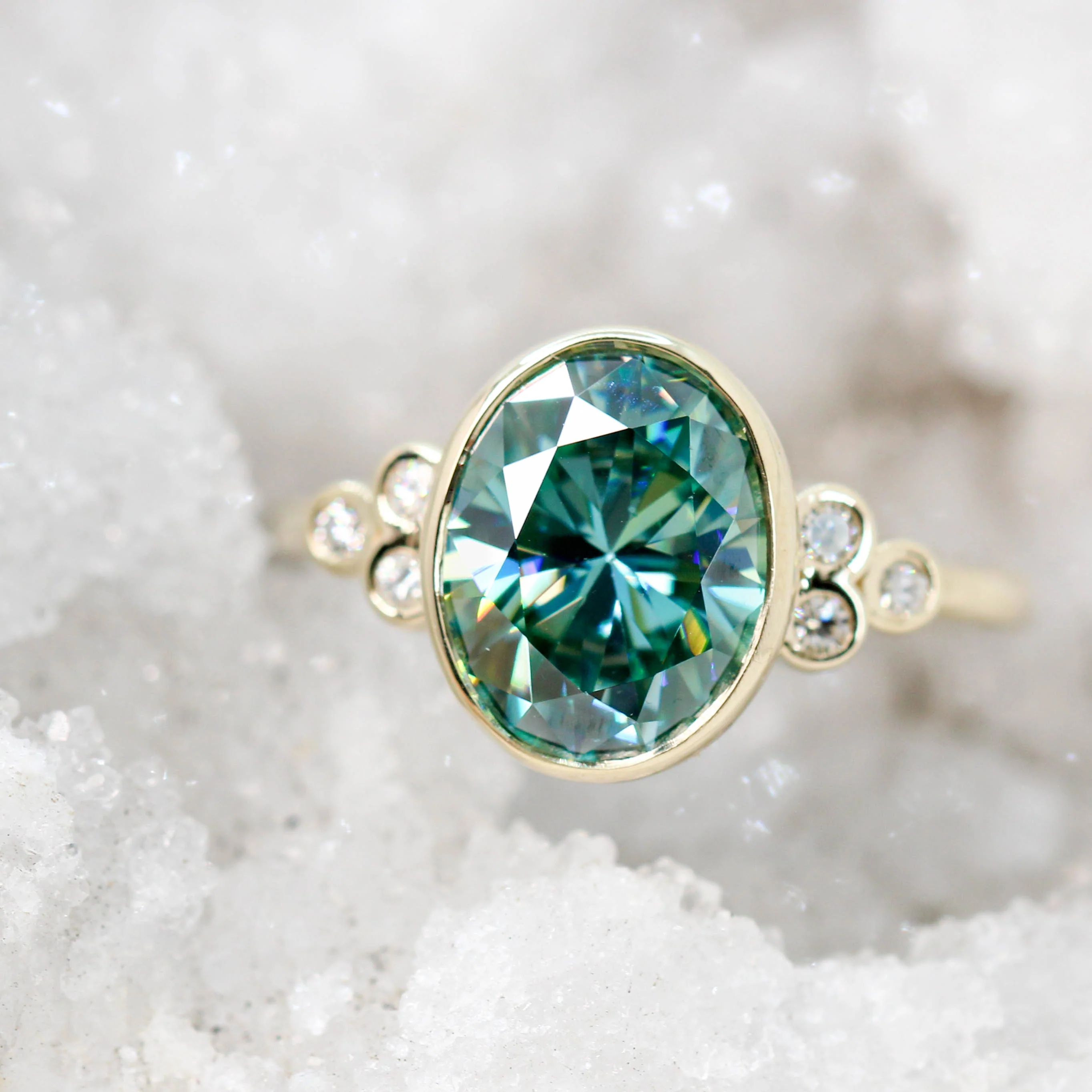 Project: Custom Sophia Ring with a 2.5 Carat Bezel Set Teal Oval Moissanite and Accent Diamonds in 14k - Image 8